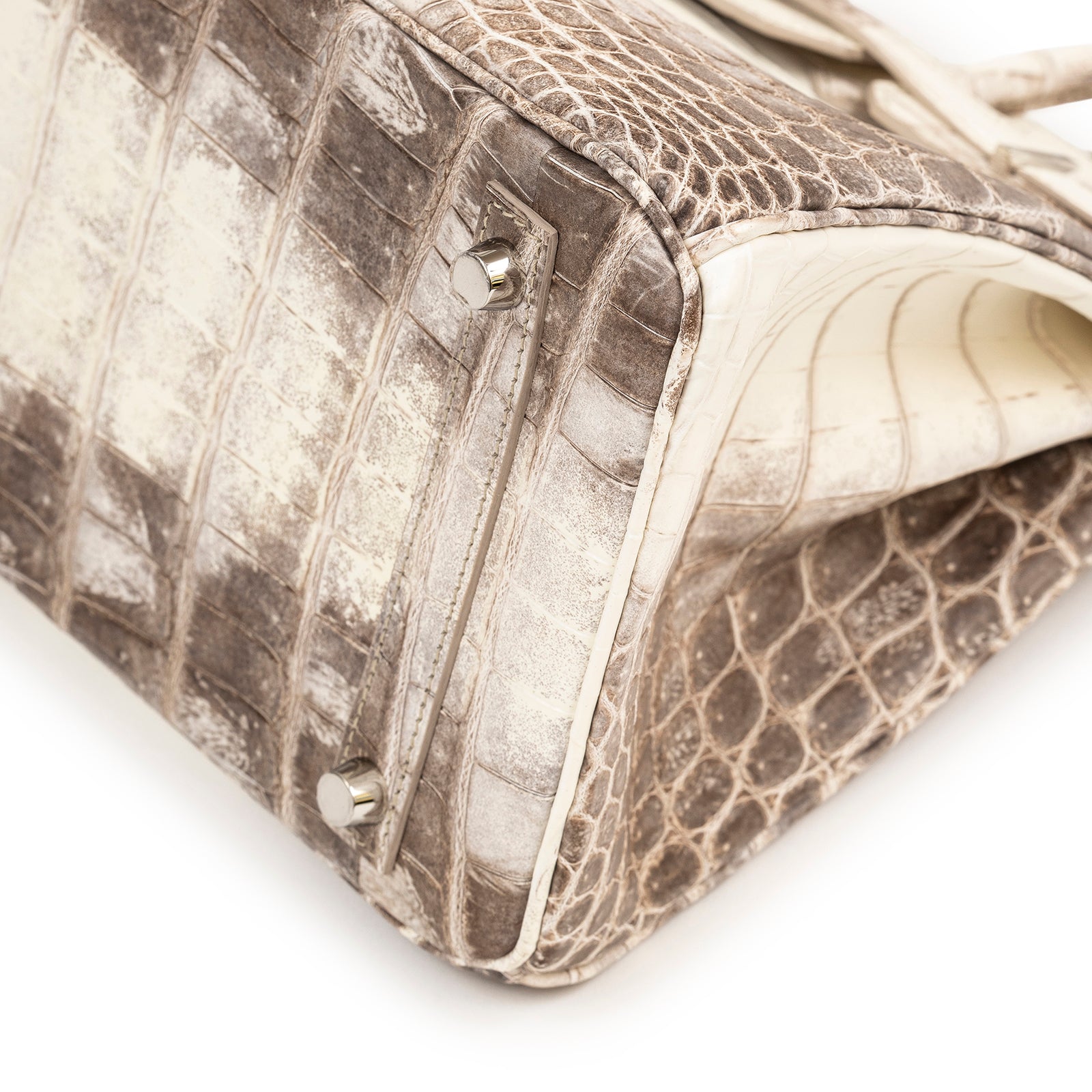 Close-up angled shot of base and feet on Hermès Himalaya Birkin 30 Matte Niloticus Crocodile Palladium Hardware