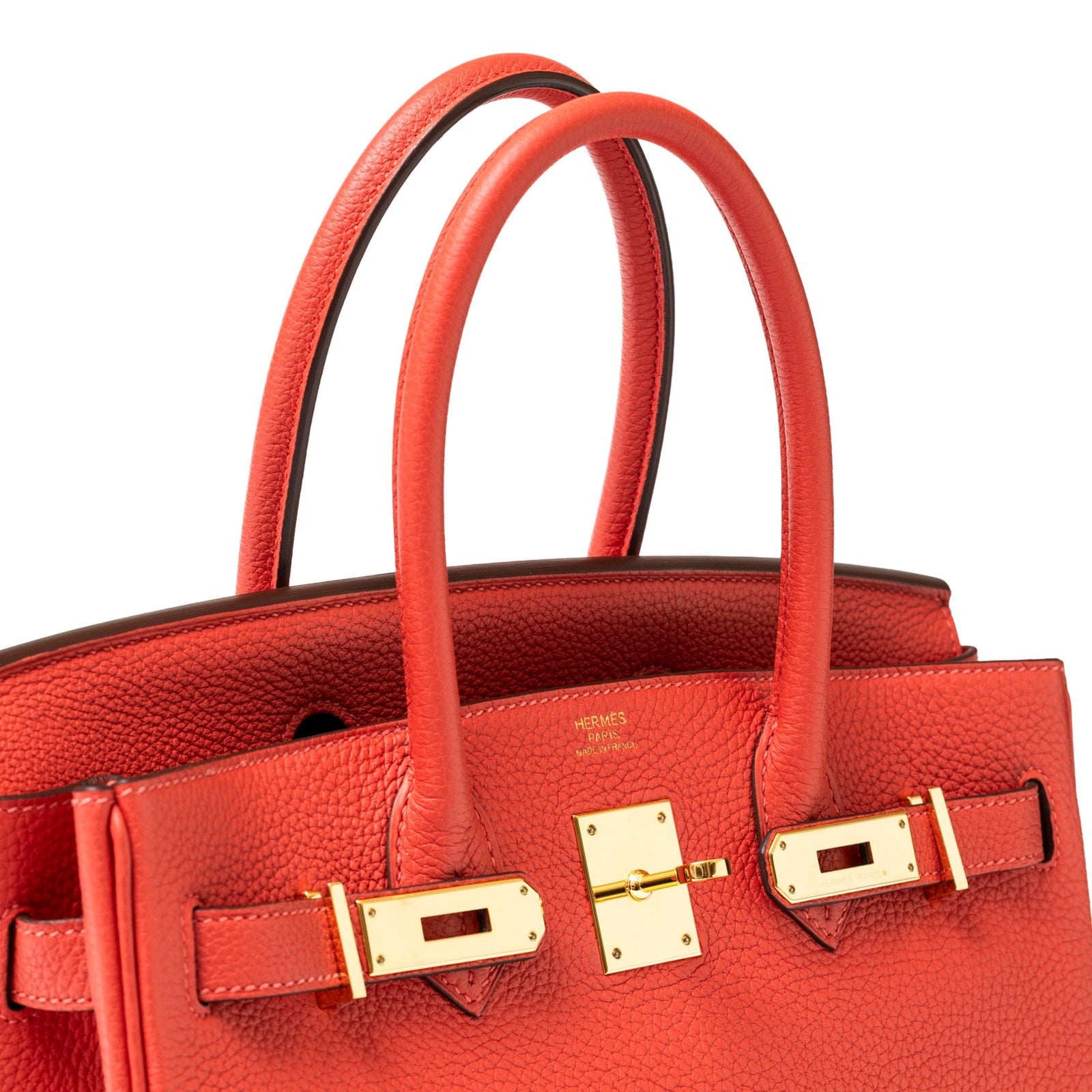 Close-up front view of Hermès Birkin 30 Rouge Pivoine Clemence Gold Hardware showing handles and clasp detail