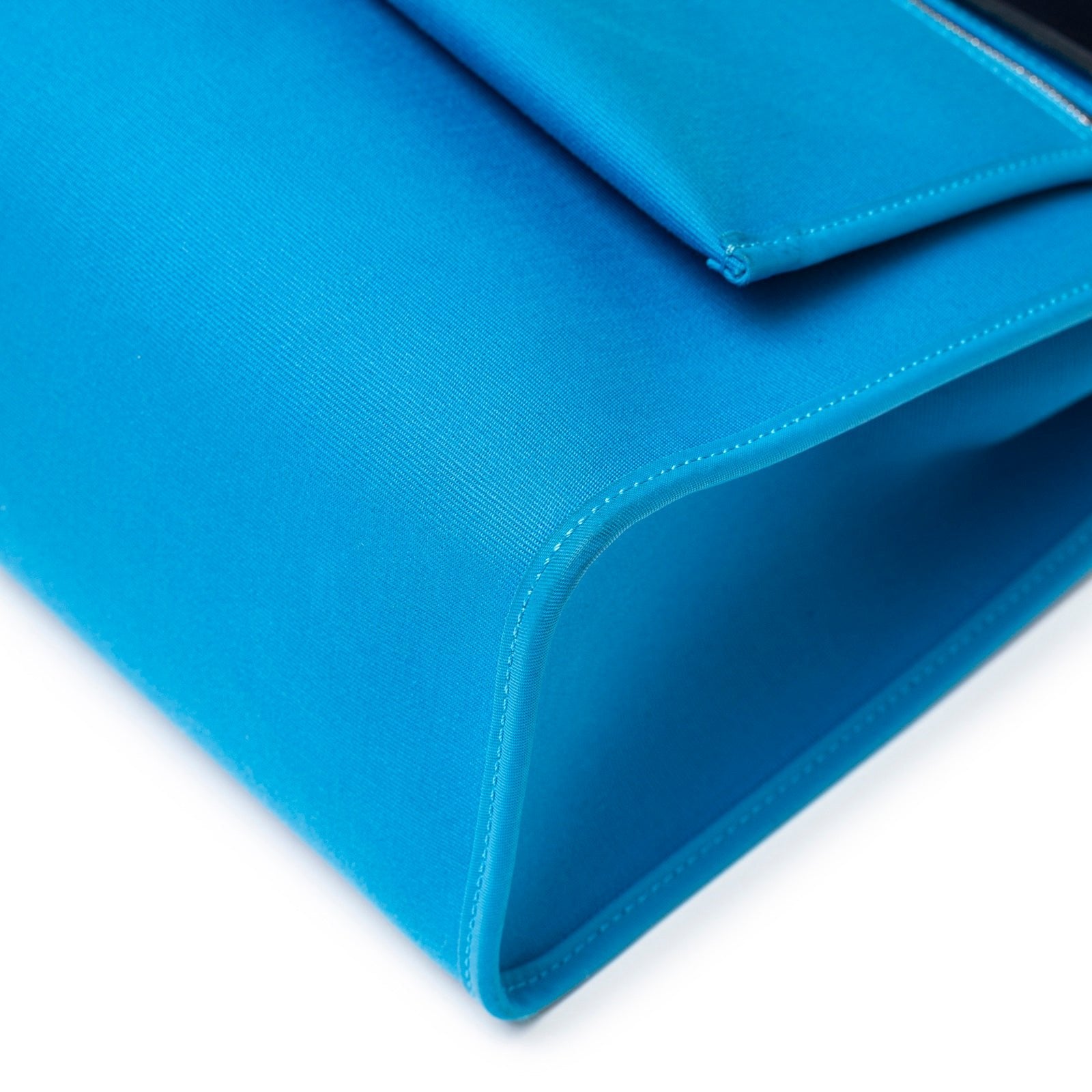 Close-up of the base corner showing stitching detail on Hermès Herbag Zip PM 31 Blue Vache Hunter Palladium Hardware