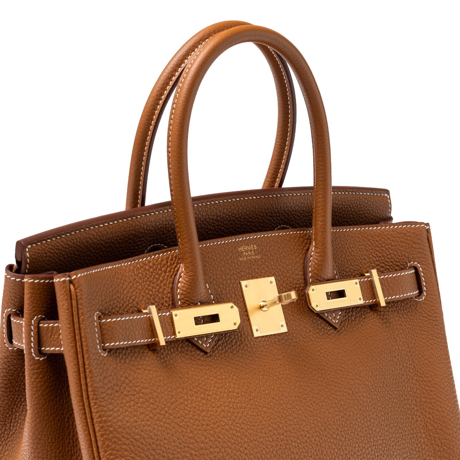 Angled close-up of Hermès Birkin 30 Gold Togo Gold Hardware showing texture and polished gold lock detail