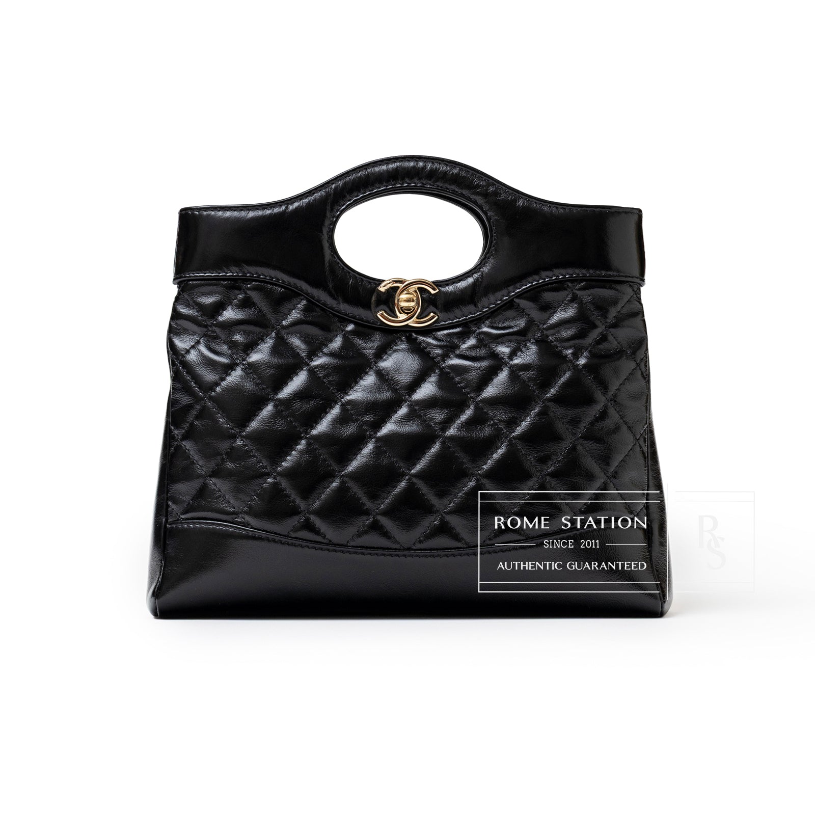 Front view of Chanel Mini 31 Shopping Tote Calfskin Black Gold Hardware with quilted leather and logo clasp