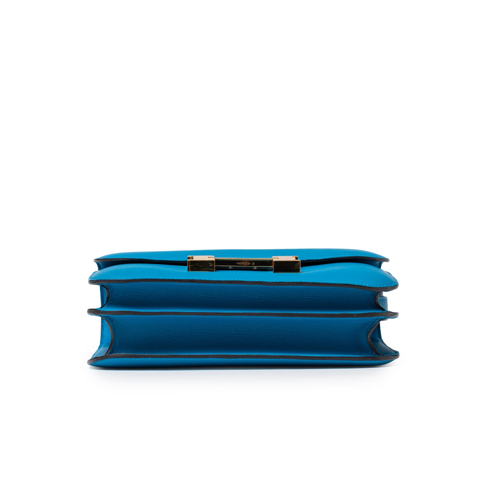 Bottom view of Hermès Constance 24 Blue Zanzibar Evercolor Gold Hardware showing three compartments and structured edges