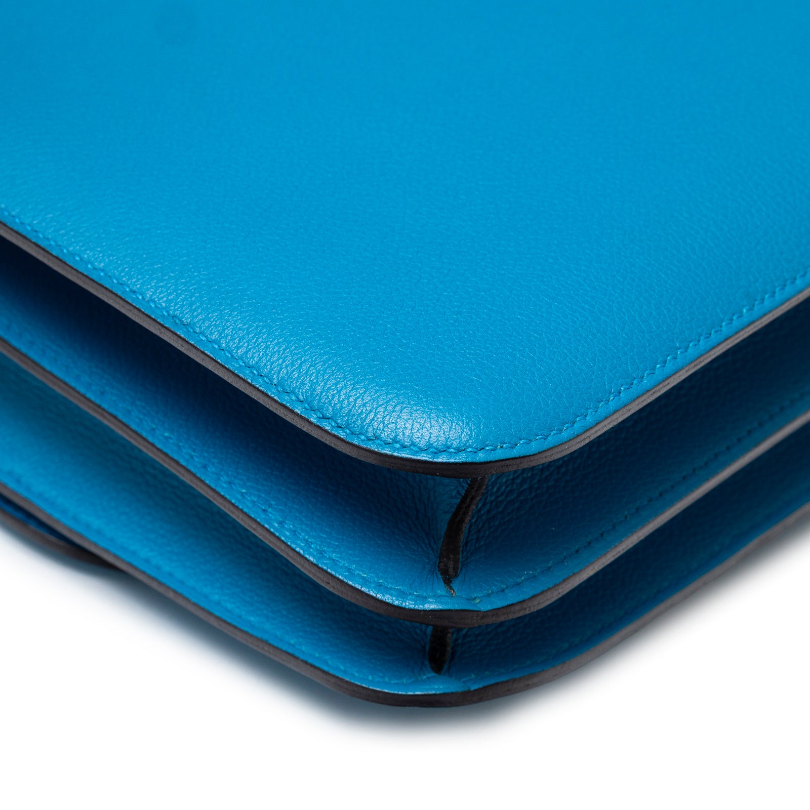 Close-up of corner stitching and texture on Hermès Constance 24 Blue Zanzibar Evercolor Gold Hardware leather bag