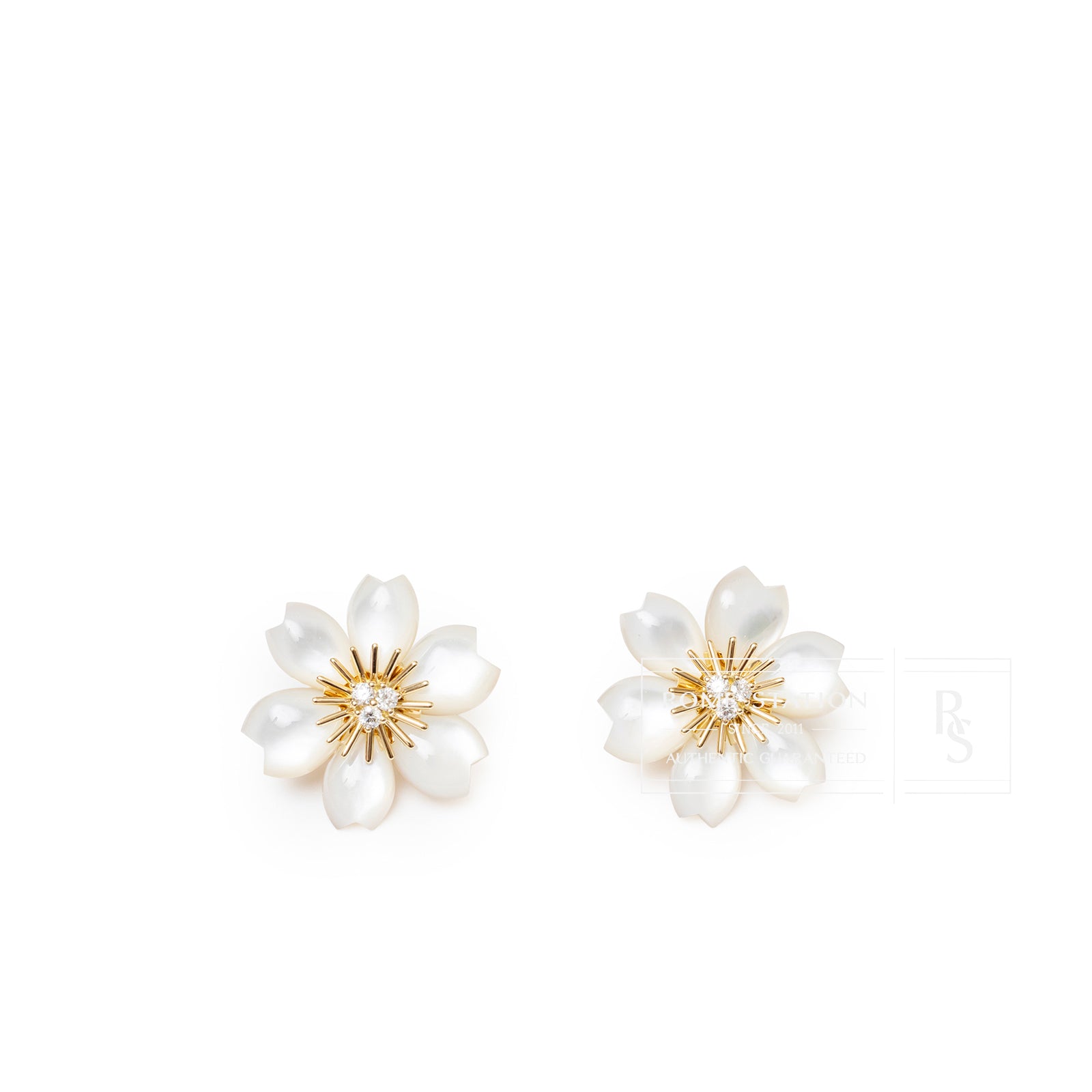 Front view of Van Cleef & Arpels Rose de Noël Earrings Mini 18K yellow gold Diamond/Mother-of-pearls showing floral design