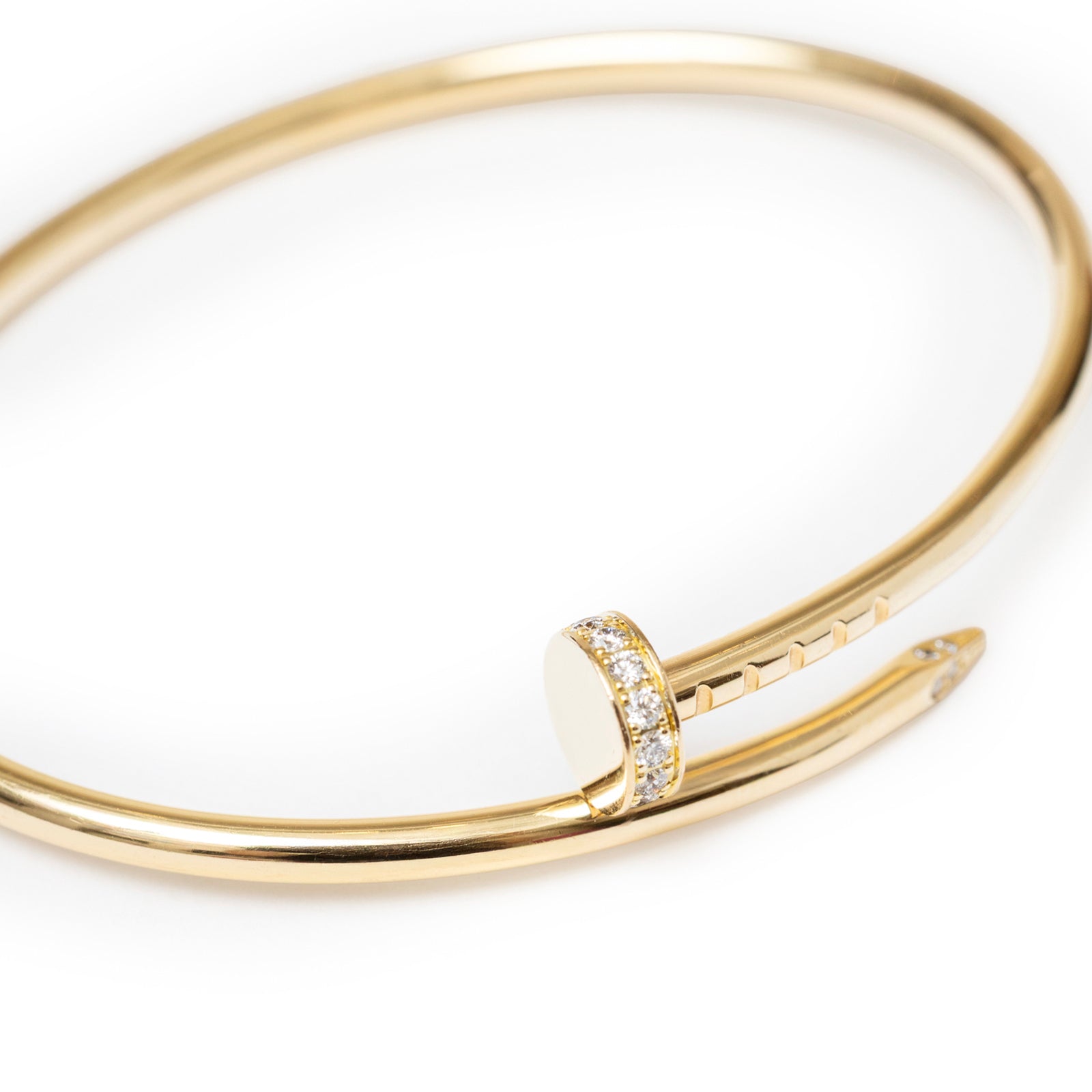 Close-up angled view of Cartier Juste un Clou bracelet Small Model Yellow Gold/Diamonds showing diamond detail