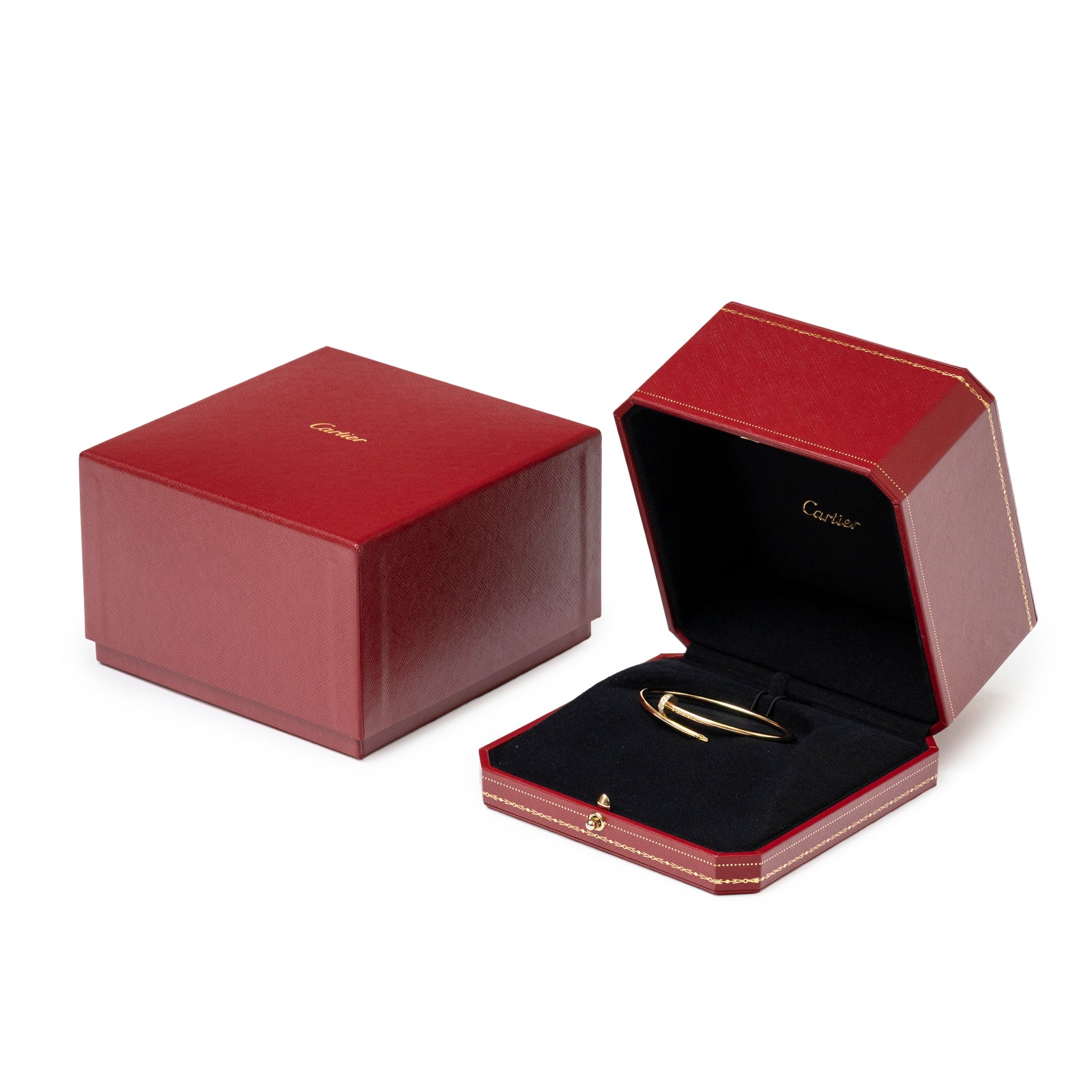 Open red Cartier box showing Cartier Juste un Clou bracelet Small Model Yellow Gold/Diamonds inside angled view