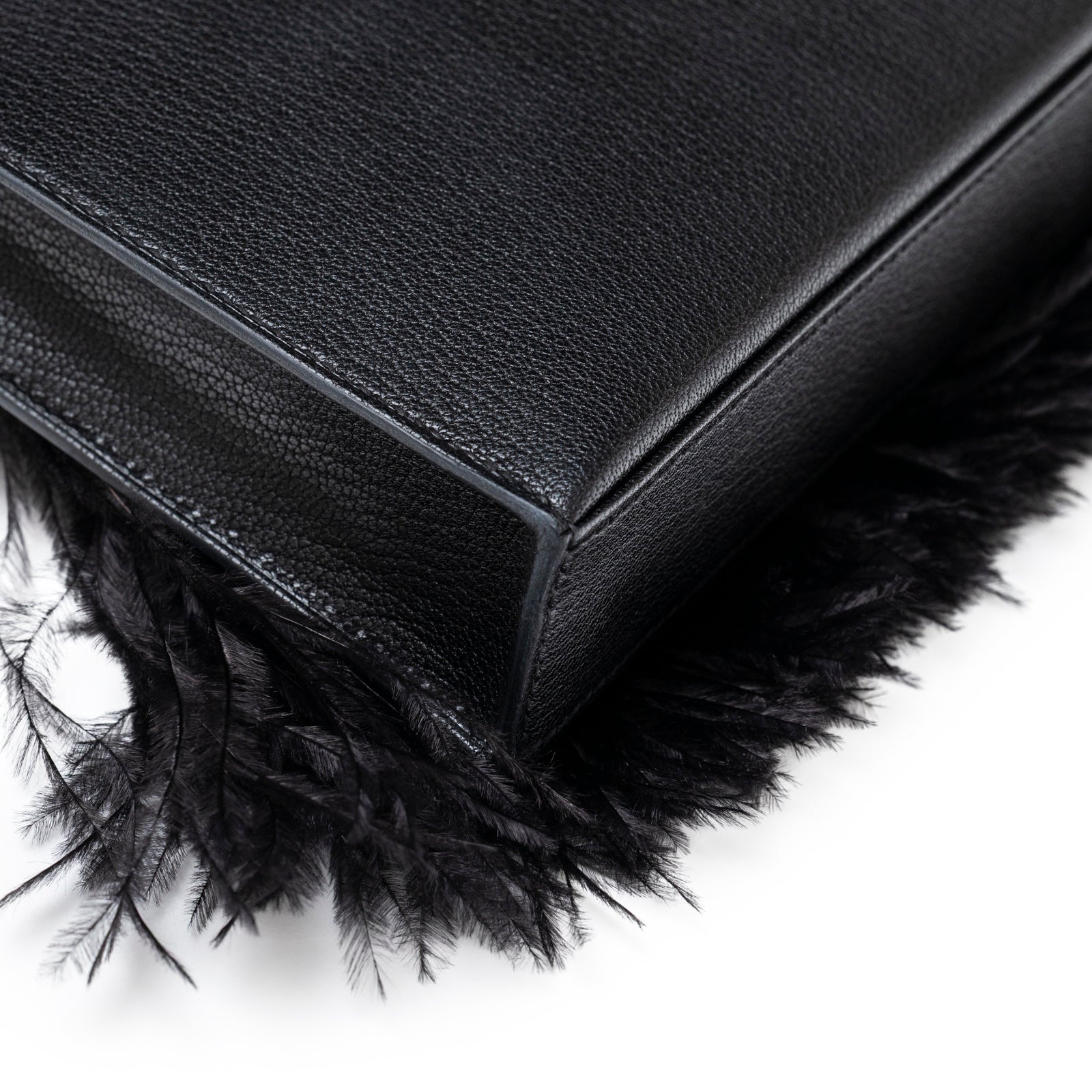 Hermès Kelly Elan Black Chevre Chamkila and Ostrich Feather Palladium Hardware clutch bag back corner detail