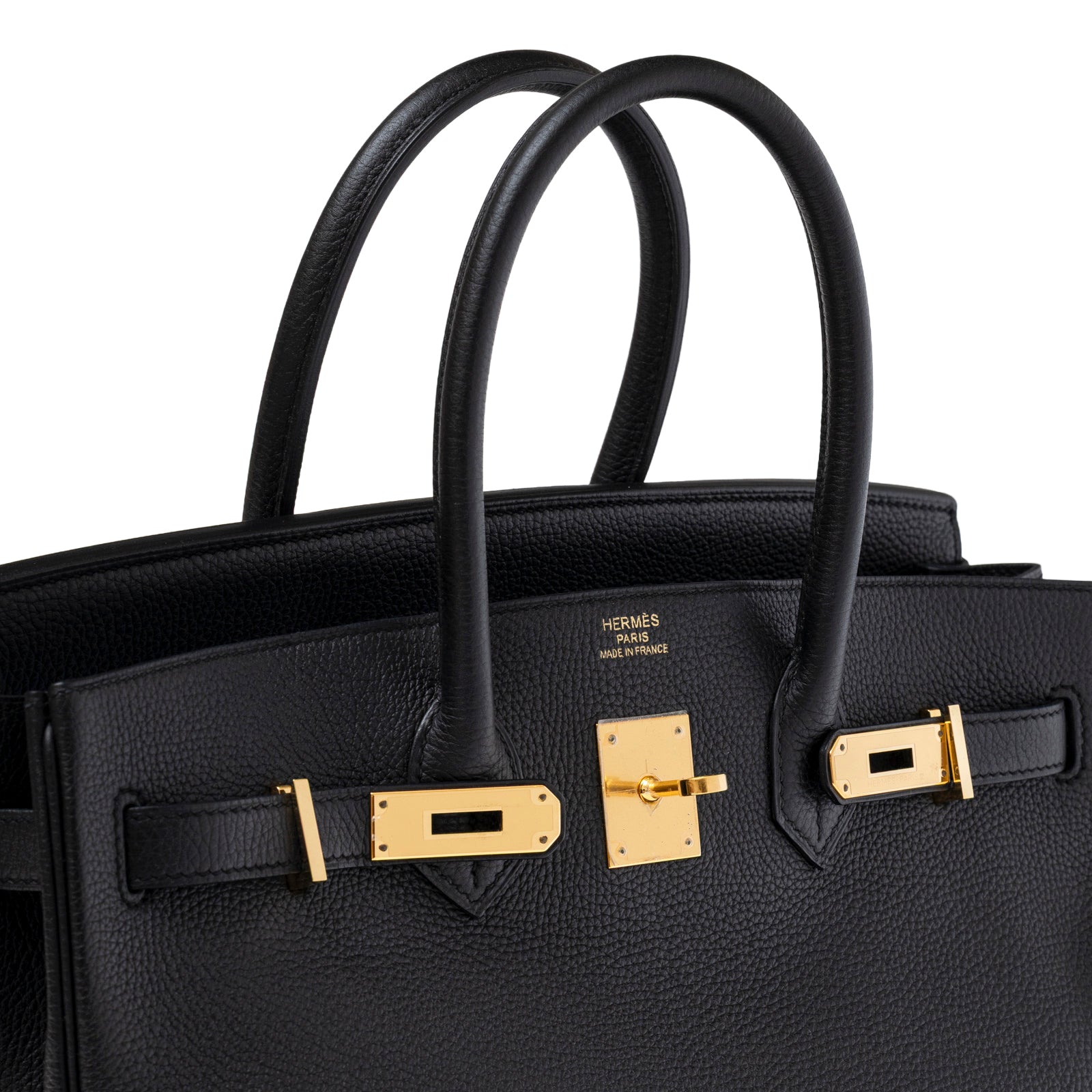 Close-up front view of Hermès Birkin 35 Black Togo Gold Hardware showing textured leather and gold lock mechanism