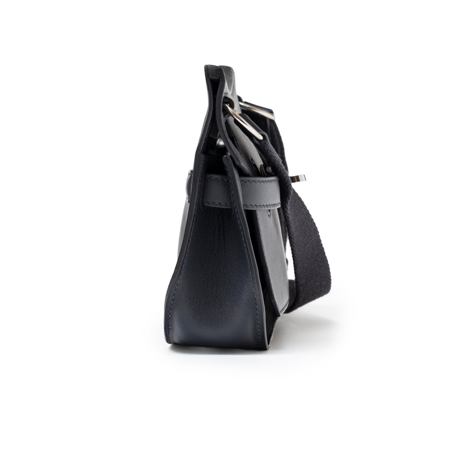 Side view of Hermès Mini Jypsiere Caban Swift Palladium Hardware showing smooth leather and strap detail