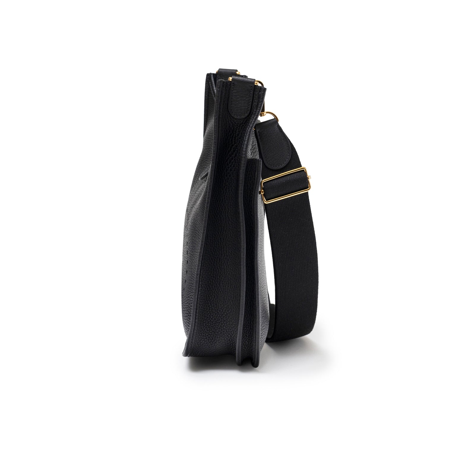 Side profile of Hermès Evelyne PM 29 Black Clemence Gold Hardware with adjustable strap and grain leather texture
