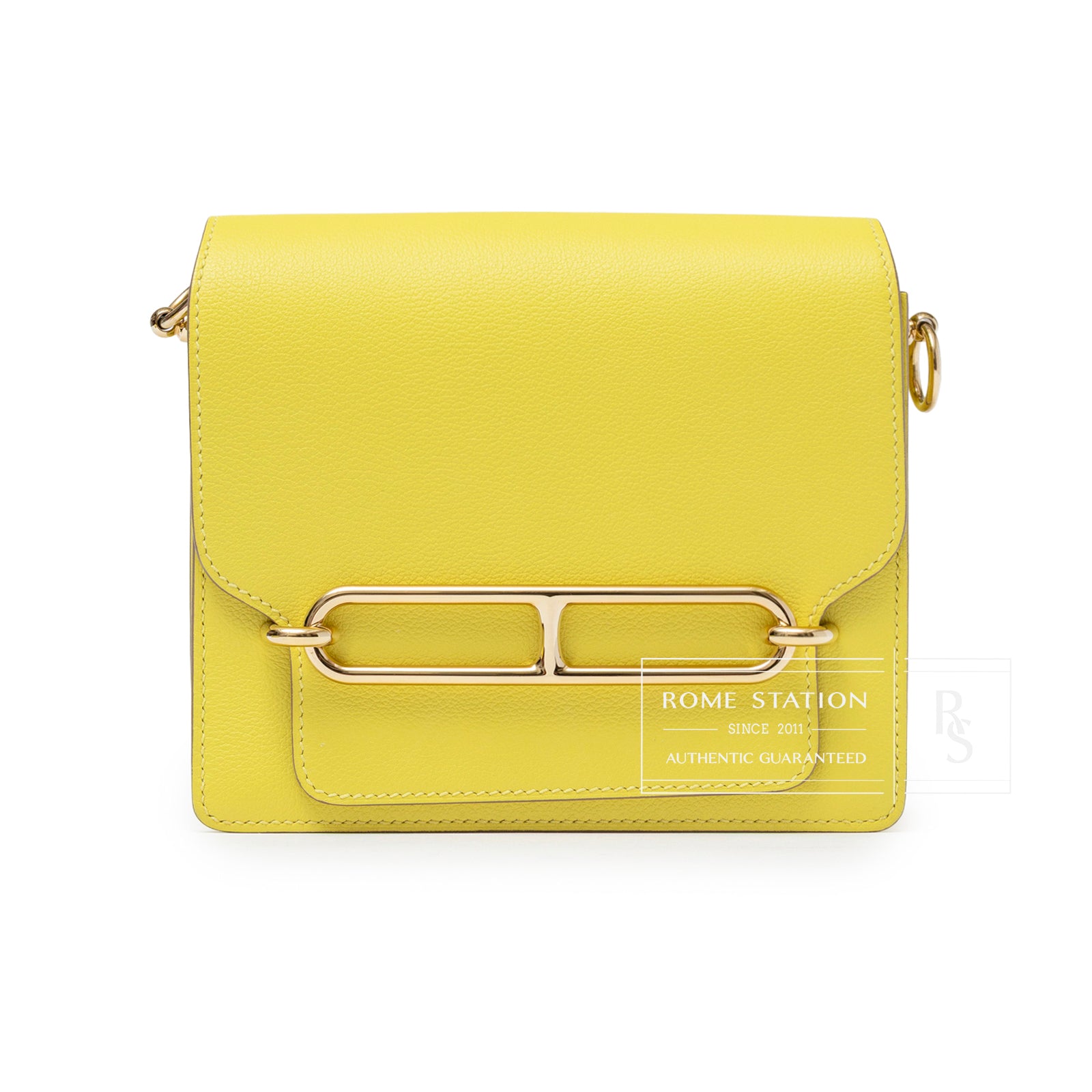 Front view of Hermès Mini Roulis Lime Evercolor Permabrass Hardware leather bag with gold-tone clasp