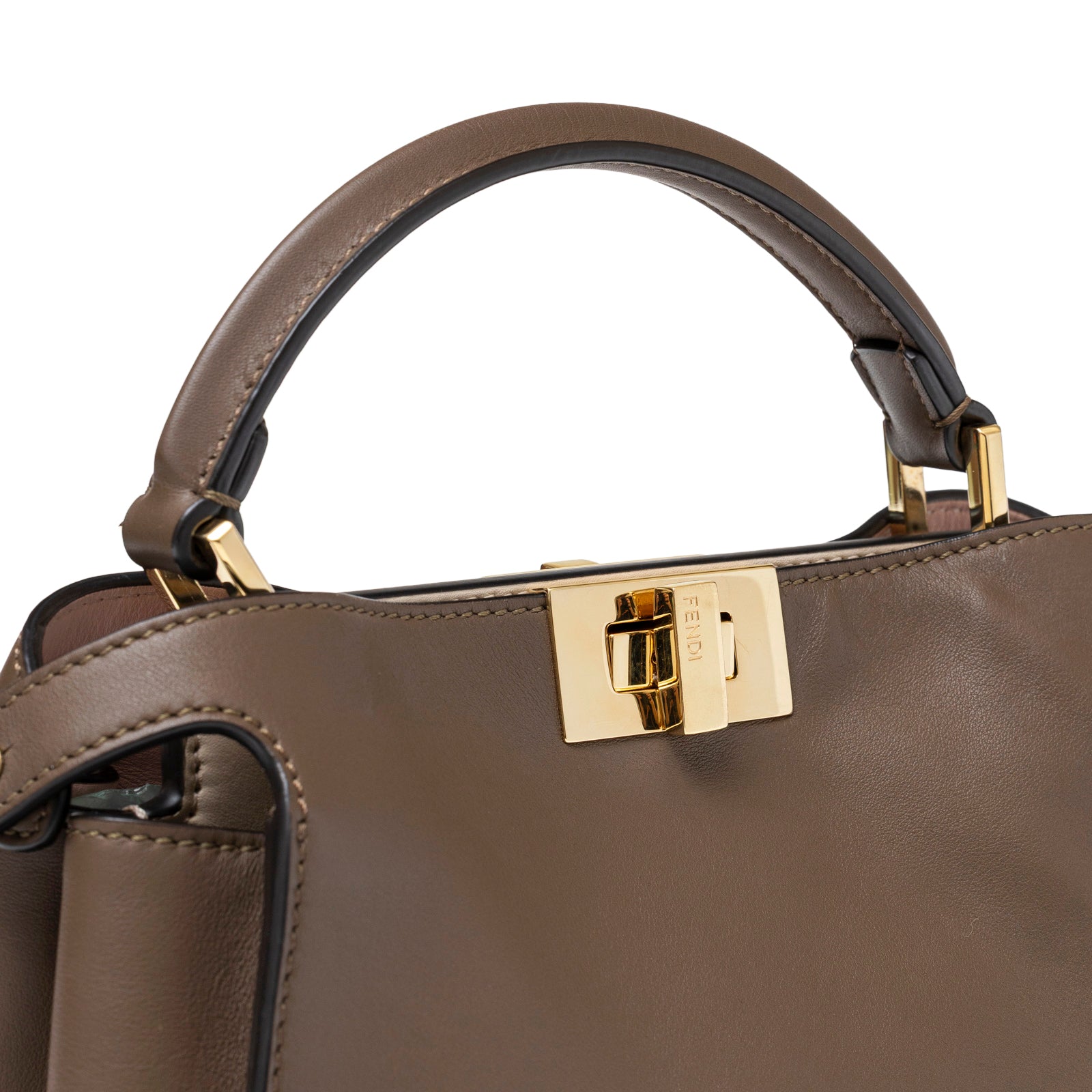 Close-up front view of Fendi Peekaboo ISeeU Small Tricolour Etoupe/Beige/Rose Calfskin Gold Hardware clasp and handle detail