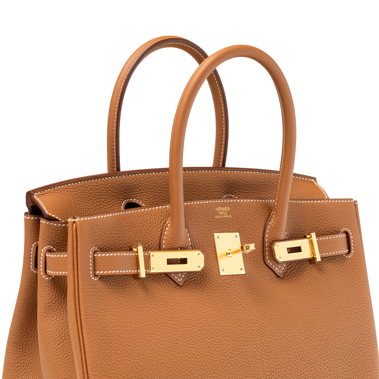 Angled close-up of Hermès Birkin 30 Gold Togo Gold Hardware showing grain texture and gold clasp detail