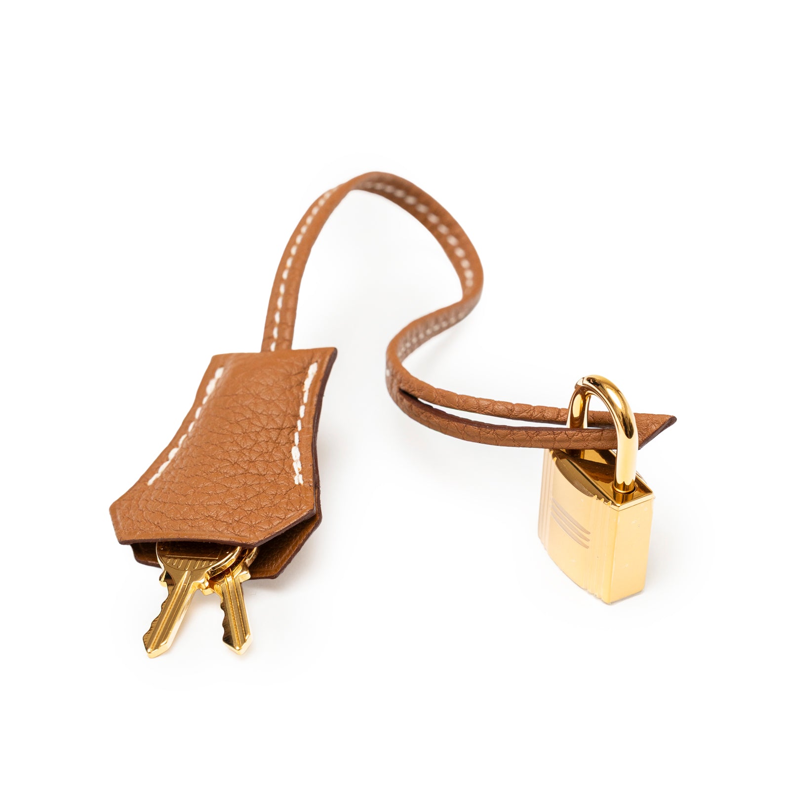 Close-up of Hermès Birkin 30 Gold Togo Gold Hardware leather clochette with keys and polished padlock detail