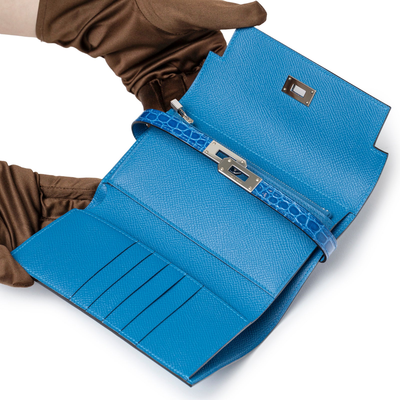 Open view of Hermès Kelly Depliant Medium Wallet Touch Mykonos/Blue Zellige Shiny Alligator/Epsom Palladium Hardware showing interior compartments and clasp detail