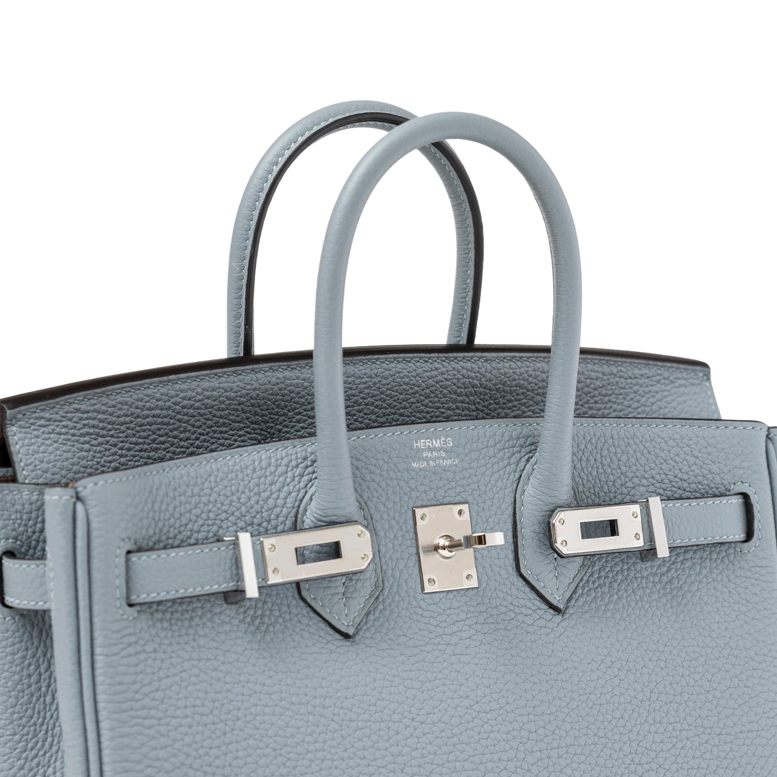 Close-up front view of Hermès Birkin 25 Blue Lin Verso Beige De Weimar Togo Palladium Hardware handle and clasp details