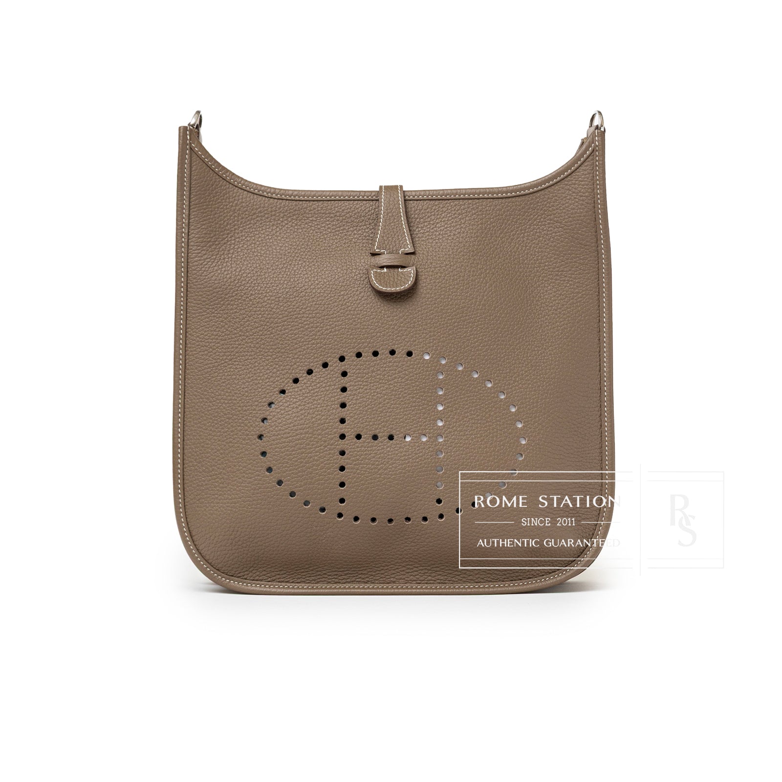 Front view of Hermès Evelyne PM 29 Etoupe Clemence Palladium Hardware showing perforated H design and leather texture