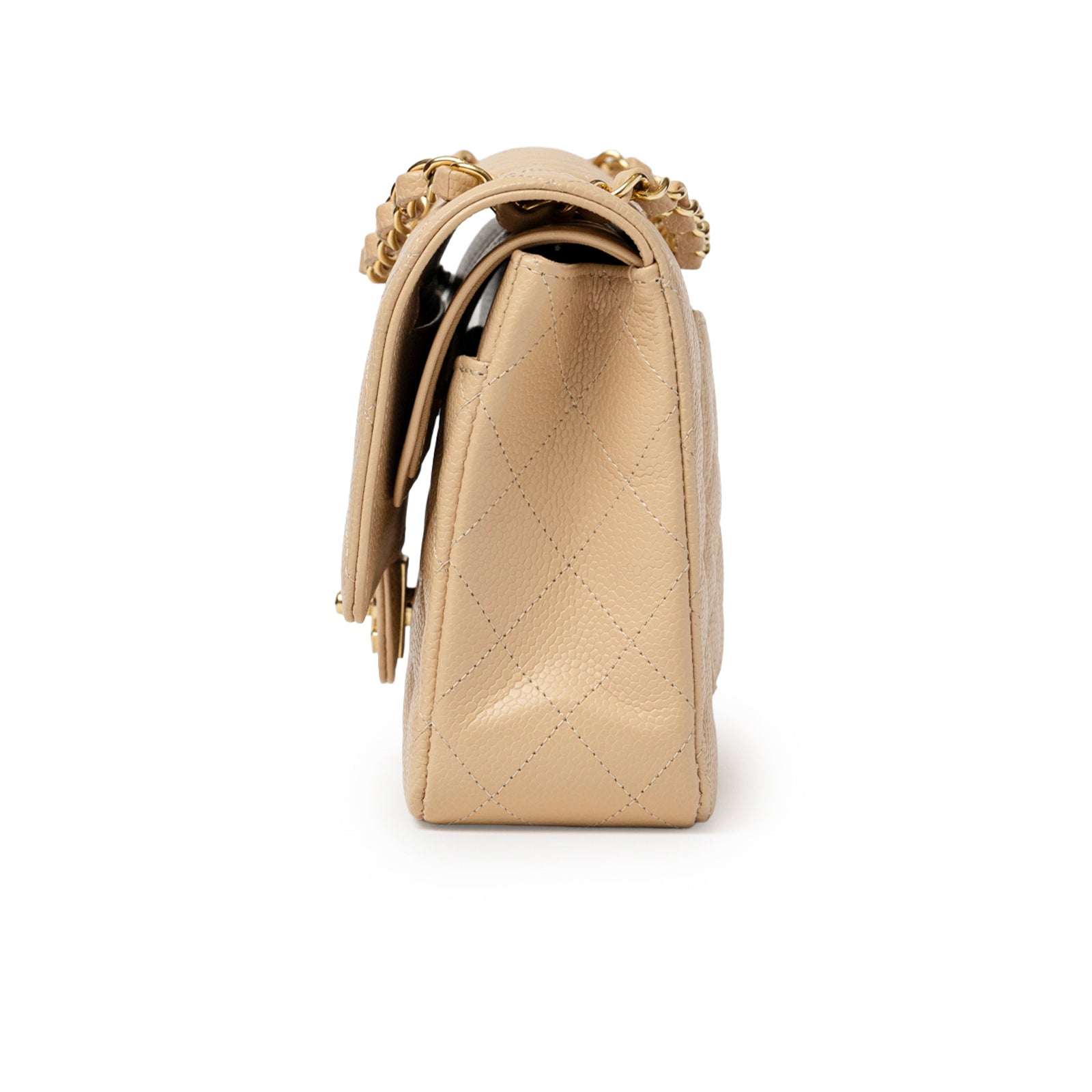 Side view of Chanel Classic Flap Medium Caviar Beige Gold Hardware showing quilted leather and chain strap detail