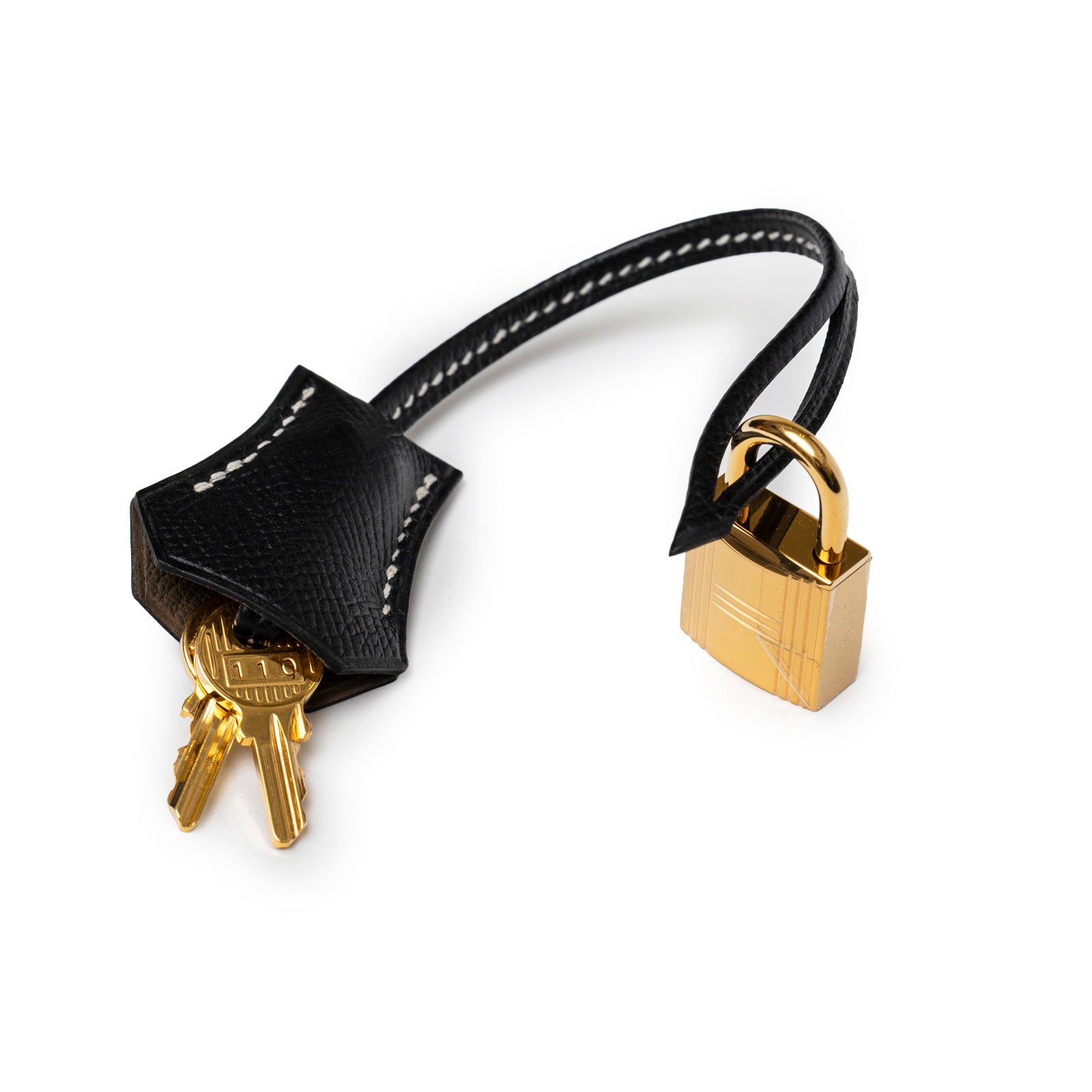 Close-up angled view of Hermès Special Order HSS Horseshoe Birkin 25 Black/Etoupe Epsom Gold Hardware lock and keys detail