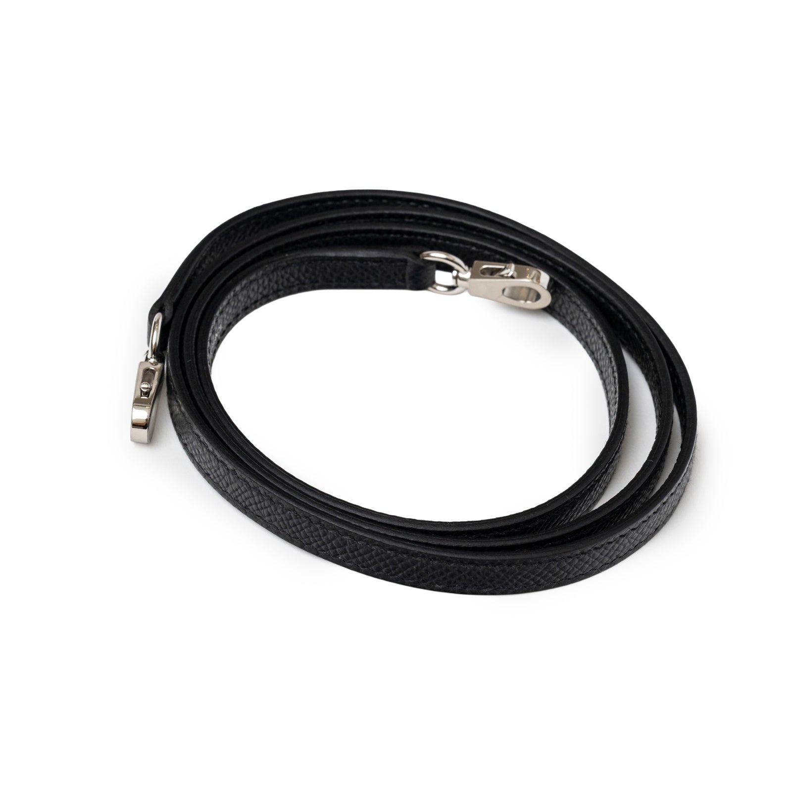 Close-up of detachable black leather shoulder strap with palladium hardware for Hermès Mini Kelly II Sellier Black Epsom Palladium Hardware