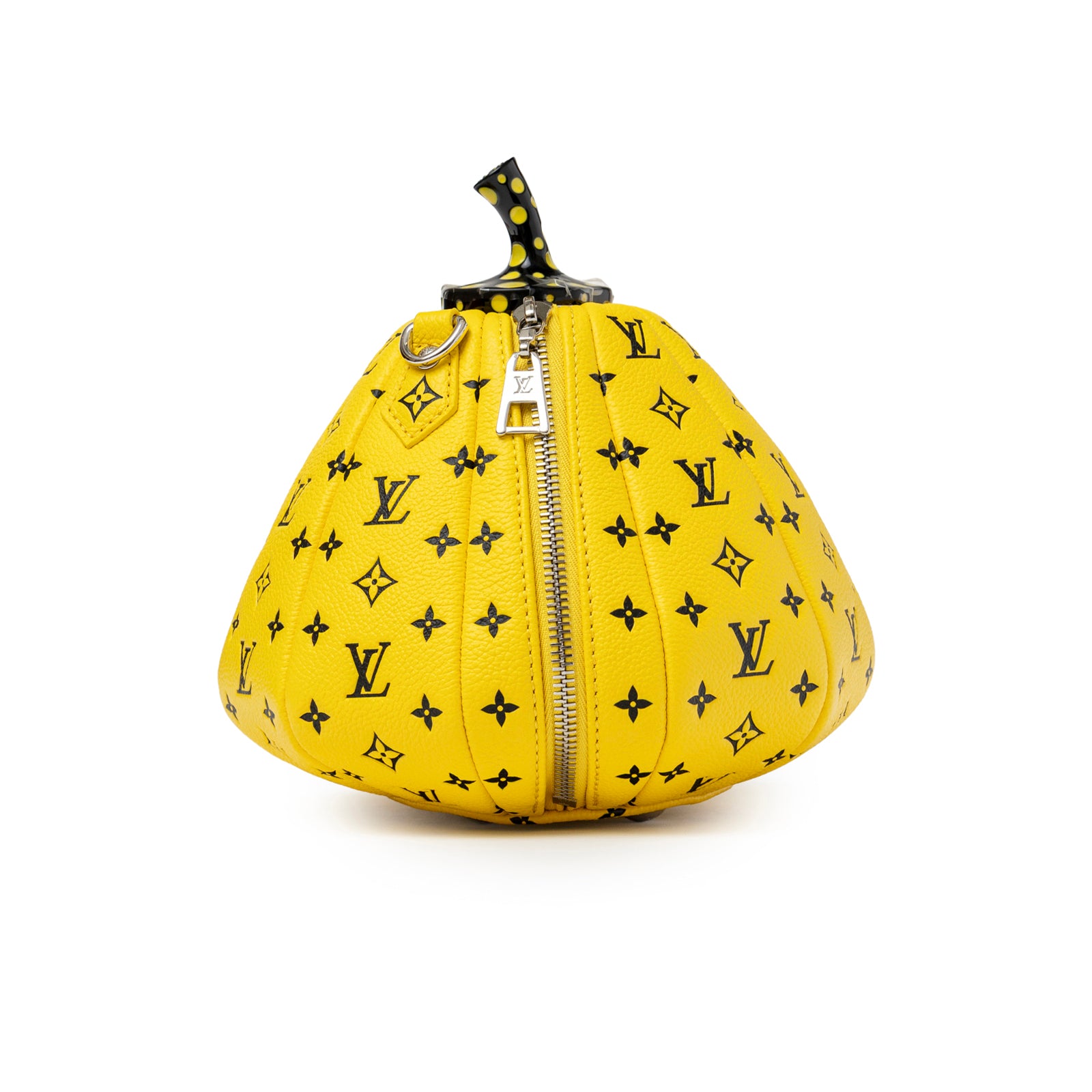Angled view of Louis Vuitton X Yayoi Kusama Limited Edition Yellow/Black Leather Pumpkin Bag with zipper and studded stem detail