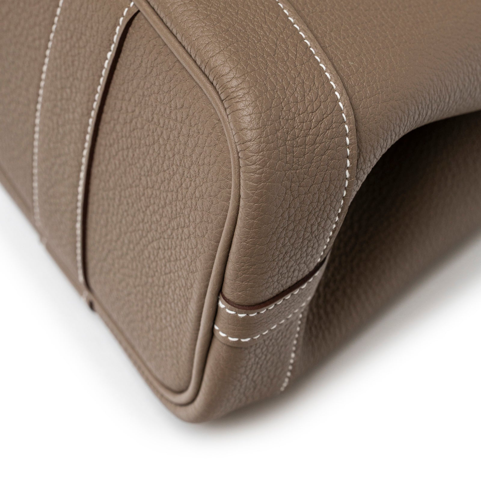 Close-up angled view of Hermès Mini Garden Party Neo 23 Etoupe Negonda Palladium Hardware corner stitching detail