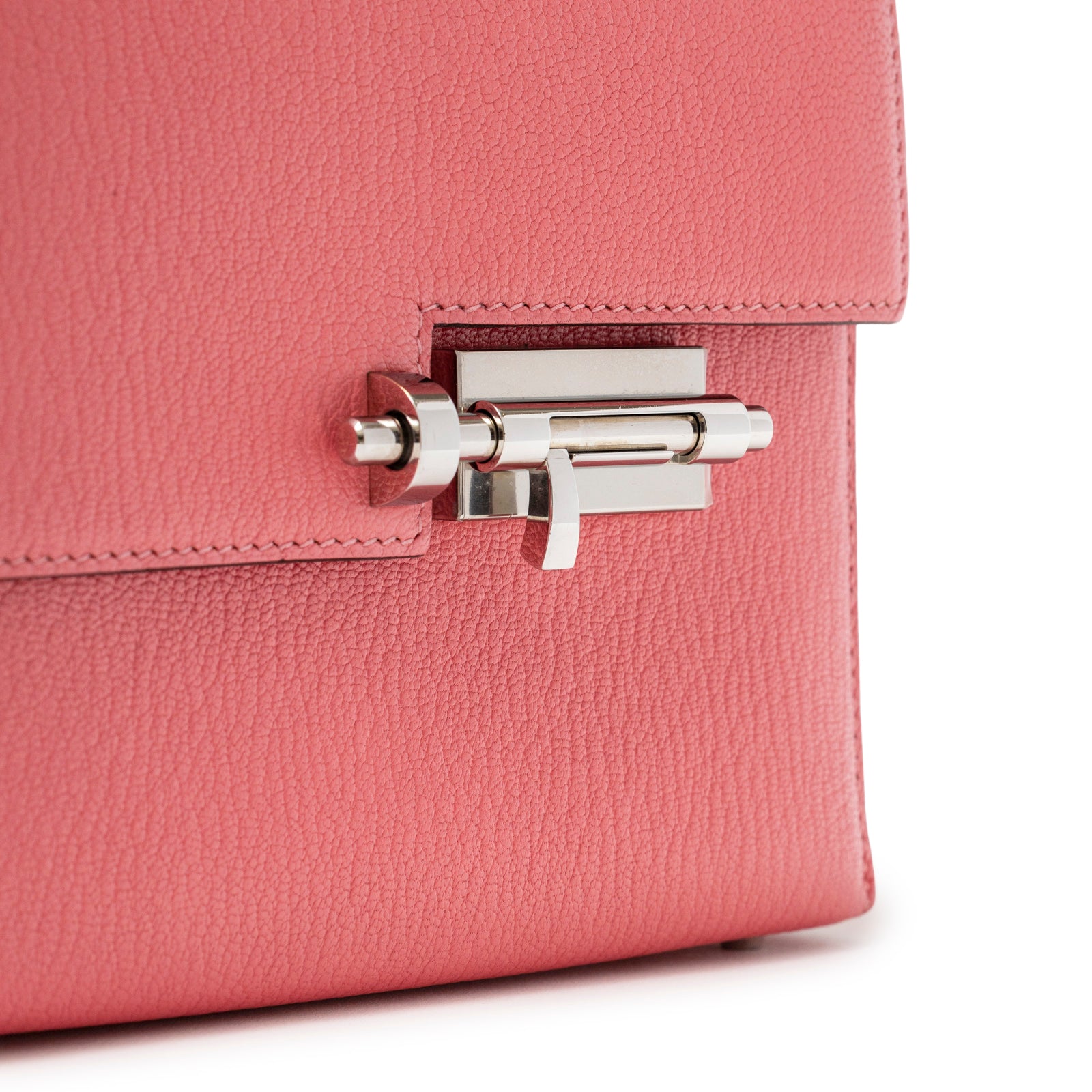 Close-up angled view of Hermès Mini Verrou Chaine Bag Rose Azalee Chevre Mysore Palladium Hardware clasp detail