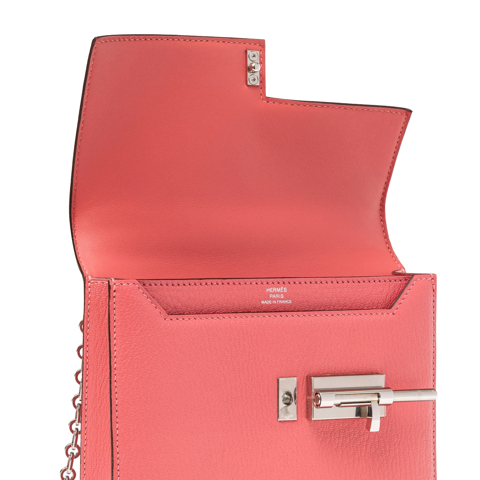Close-up angled view of open Hermès Mini Verrou Chaine Bag Rose Azalee Chevre Mysore Palladium Hardware showing interior and clasp detail