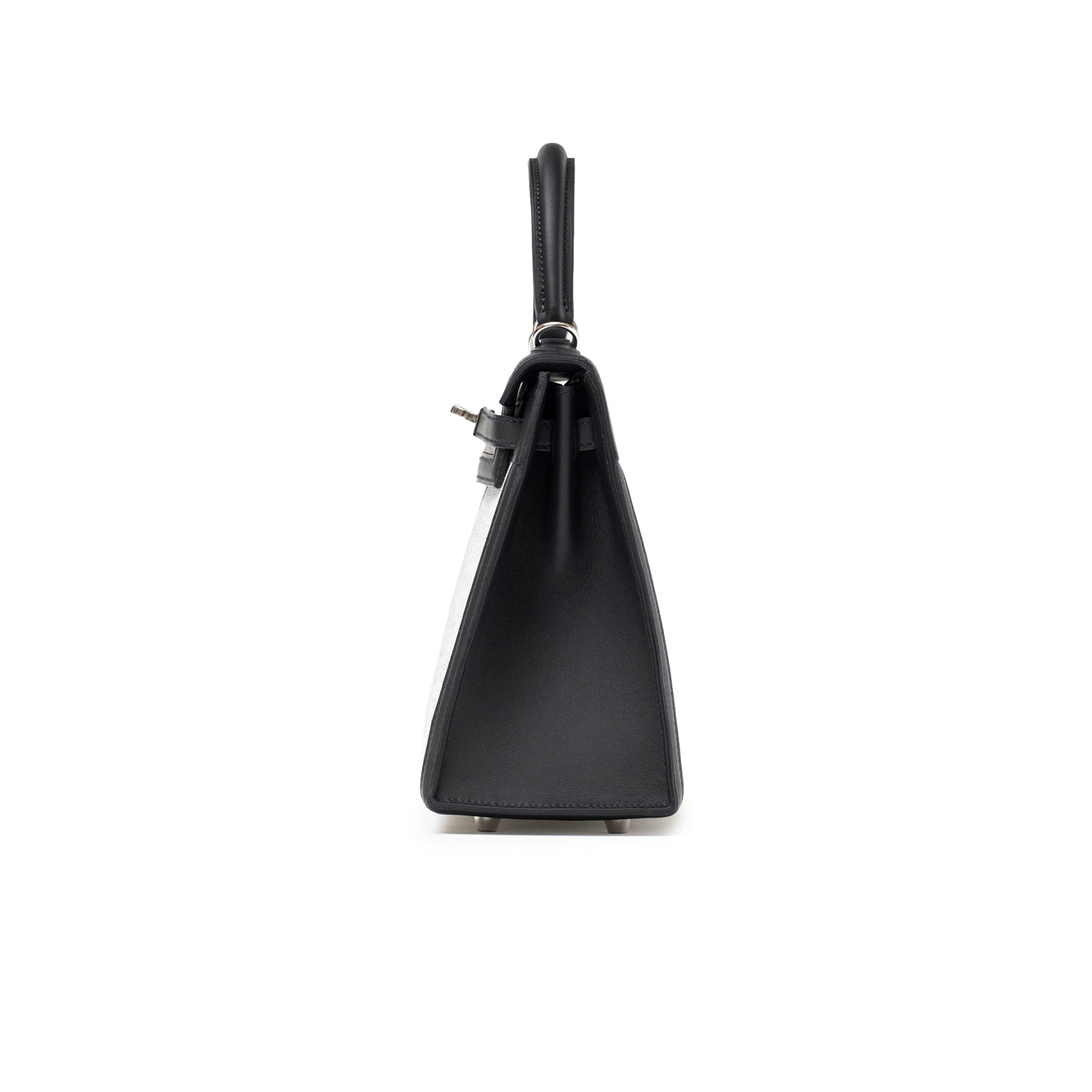 Side view of Hermès Kelly 25 Sellier Ecru Black Swift Toile H Canvas Swift Palladium Hardware bag