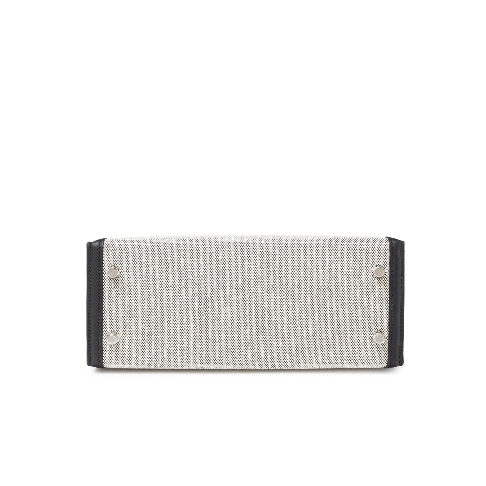 Bottom view of Hermès Kelly 25 Sellier Ecru Black Swift Toile H Canvas Swift Palladium Hardware showing base and feet