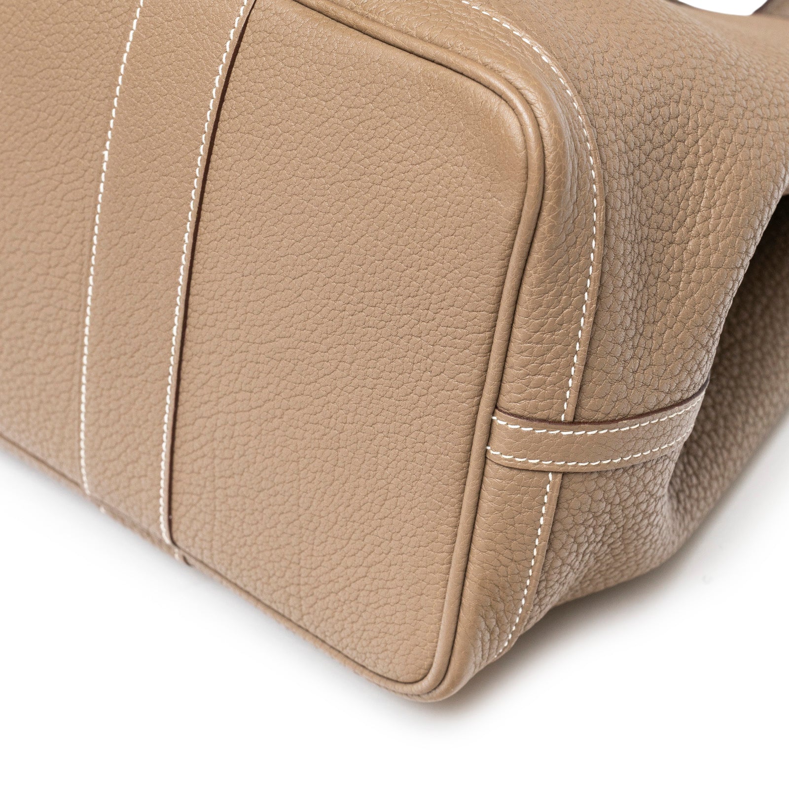 Close-up of base and stitching detail on Hermès Garden Party 36 Etoupe Negonda Palladium Hardware bag