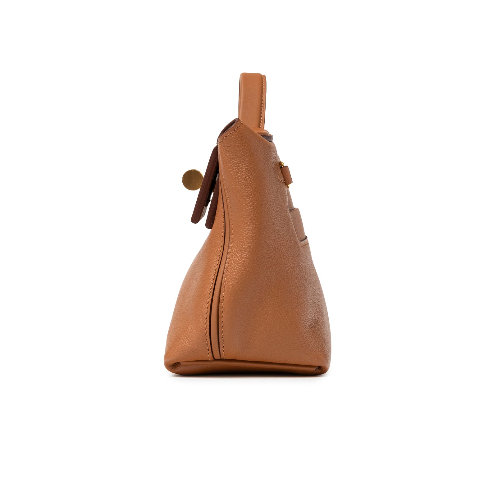 Side profile of Hermès 24/24 21 Gold Evercolor Swift Gold Hardware handbag showing leather texture and clean stitching