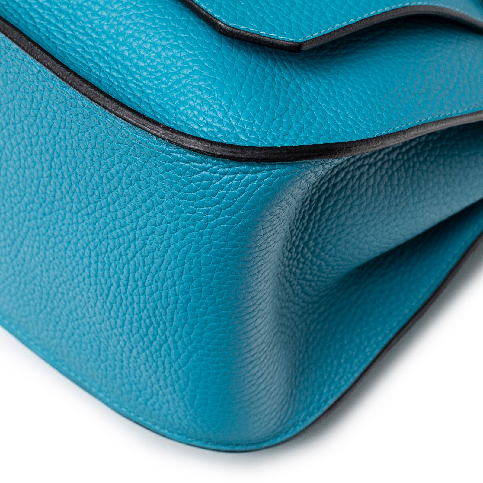 Close-up of textured leather and edge detail on Hermès Jypsiere 31 Turquoise Clemence Palladium Hardware bag