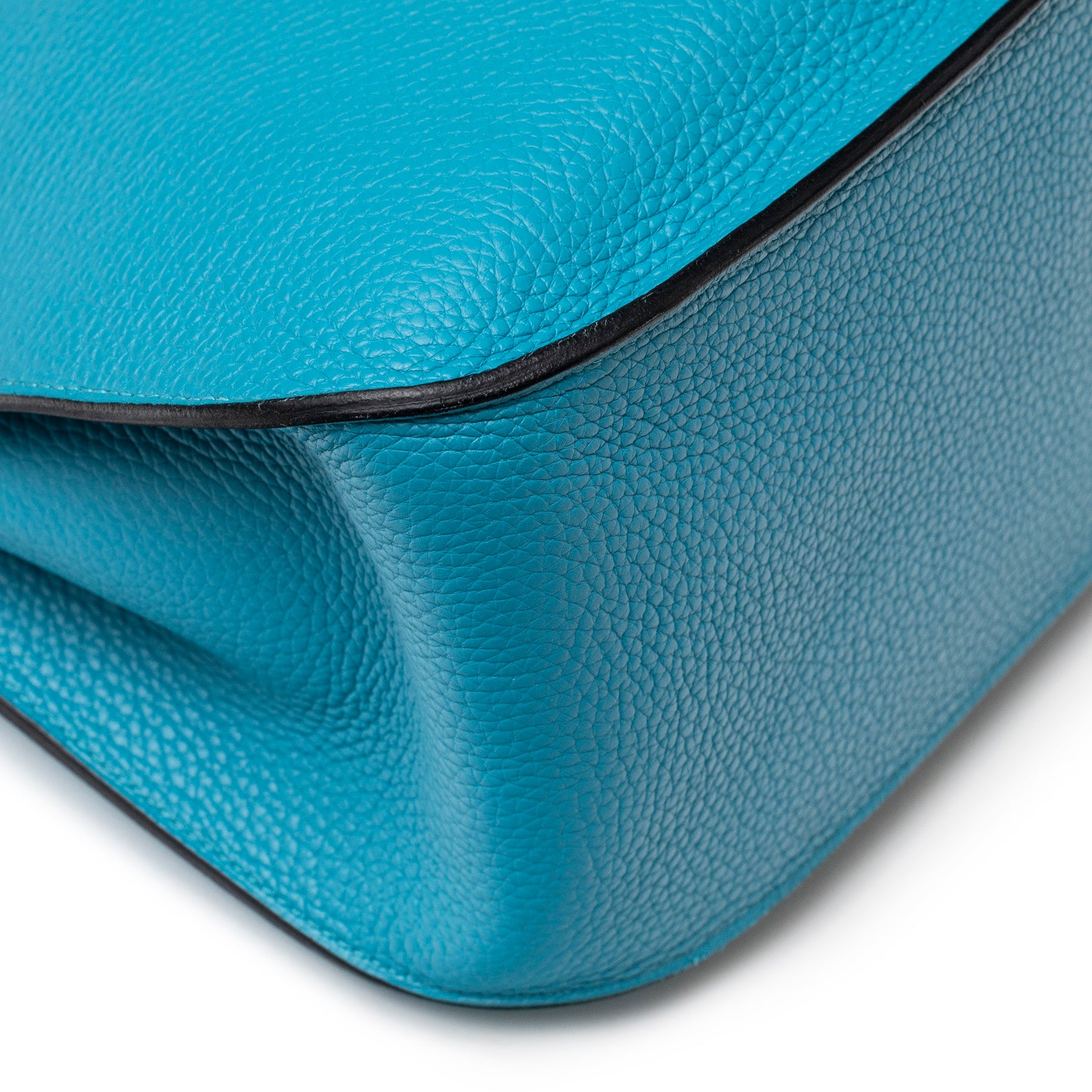 Close-up of corner detail showing turquoise Clemence leather grain on Hermès Jypsiere 31 Turquoise Clemence Palladium Hardware