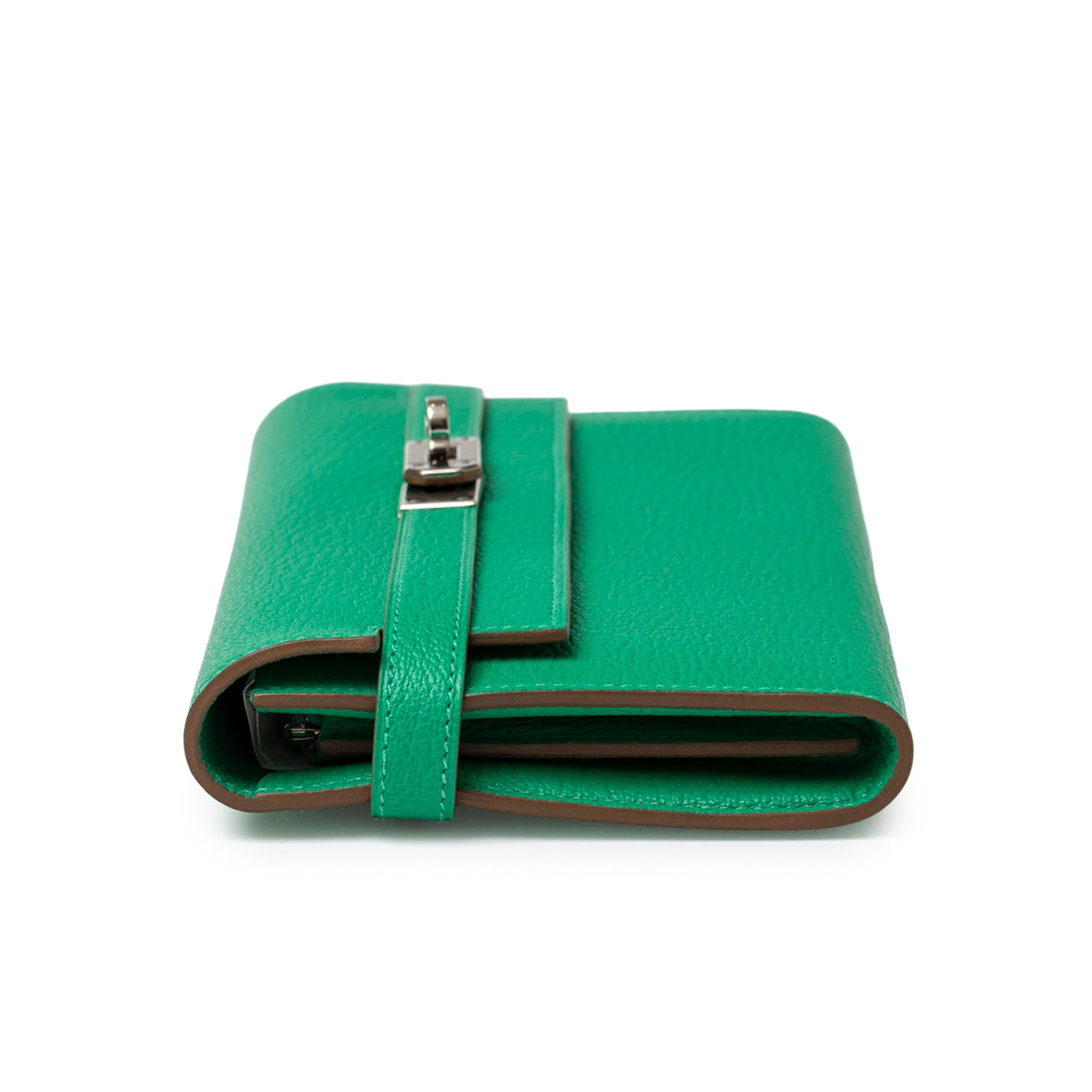Folded side view of Hermès Kelly Long Wallet Menthe Chevre Mysore Palladium Hardware showing strap and clasp detail