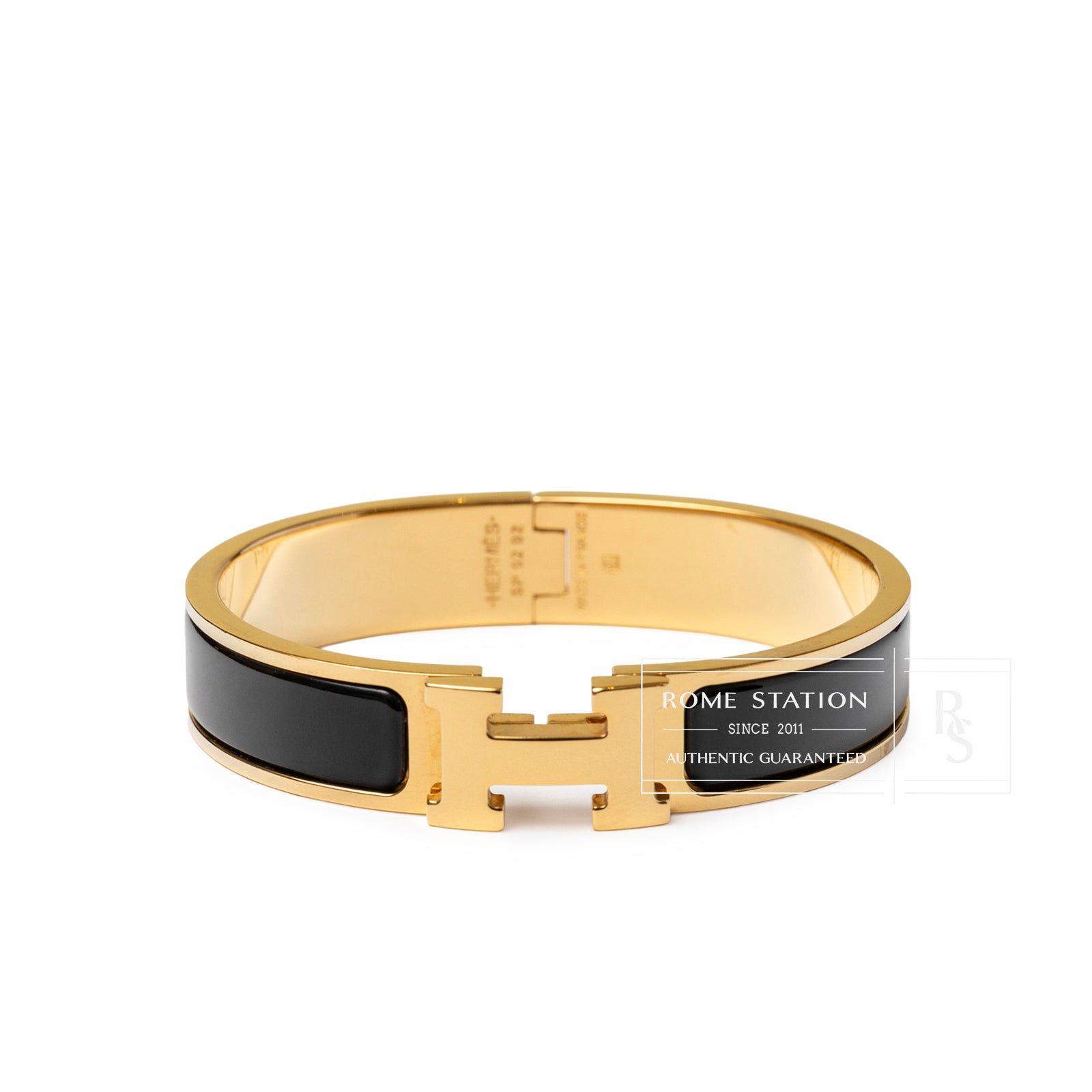 Front view of Hermès Clic H bracelet PM Black Gold Hardware showcasing black enamel and gold clasp detail