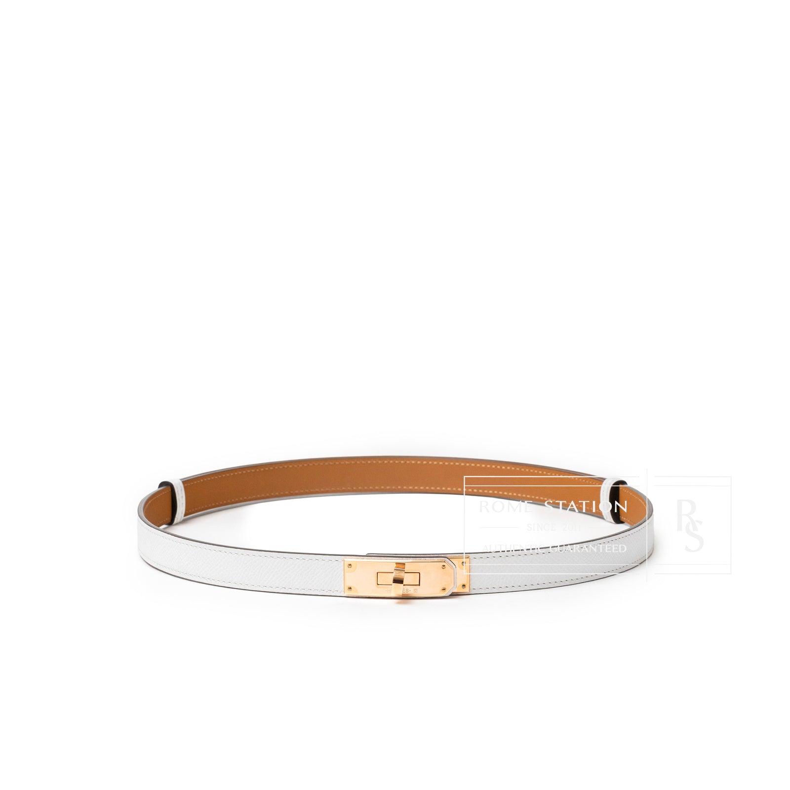 Front view of Hermès Kelly 18 Belt Epsom Rose Gold Hardware showing clasp and white leather detail