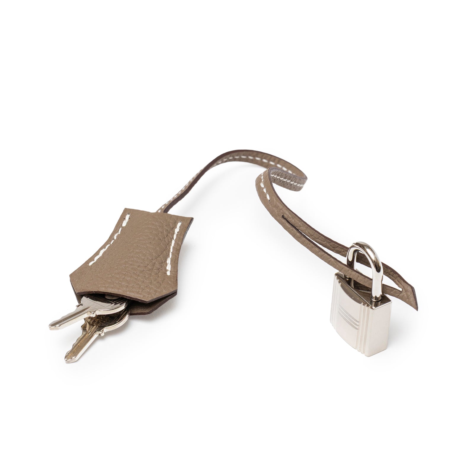 Close-up of Hermès Birkin 30 Etoupe Togo Palladium Hardware lock and keys with leather clochette detail