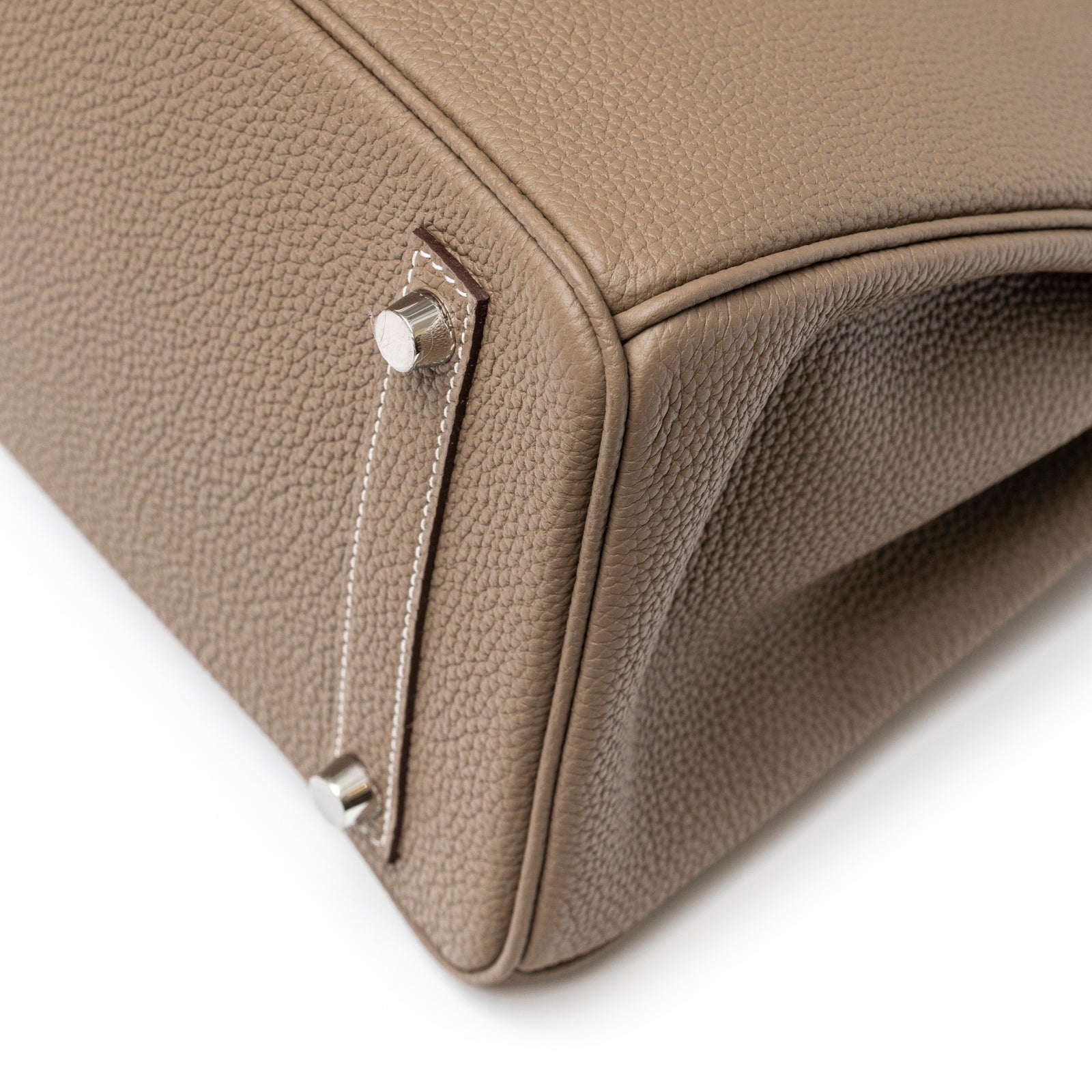 Close-up of bottom corner and palladium hardware feet on Hermès Birkin 30 Etoupe Togo Palladium Hardware bag