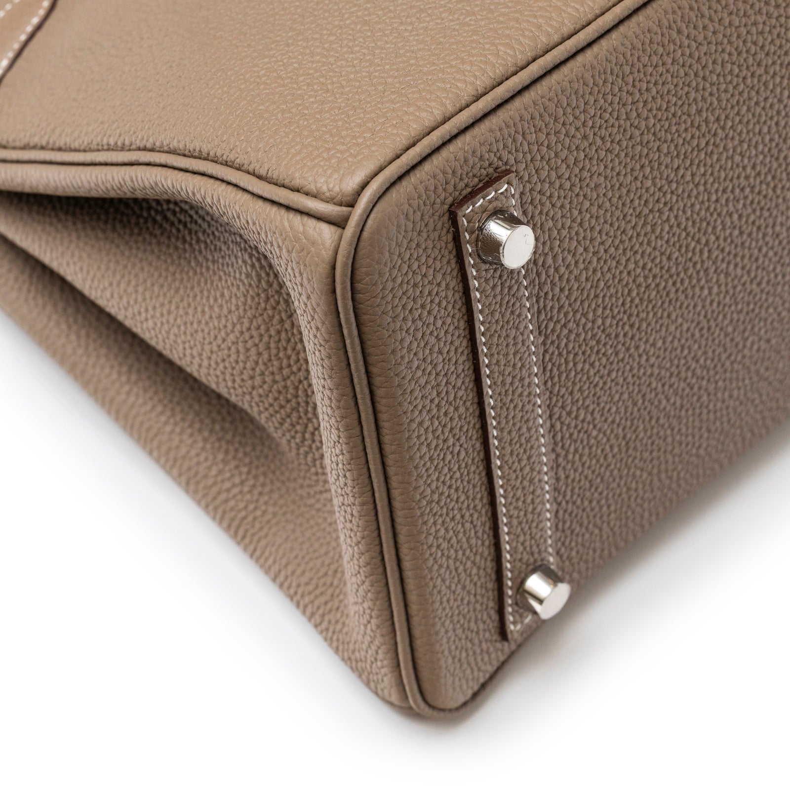Close-up of bottom corner and hardware studs on Hermès Birkin 30 Etoupe Togo Palladium Hardware bag