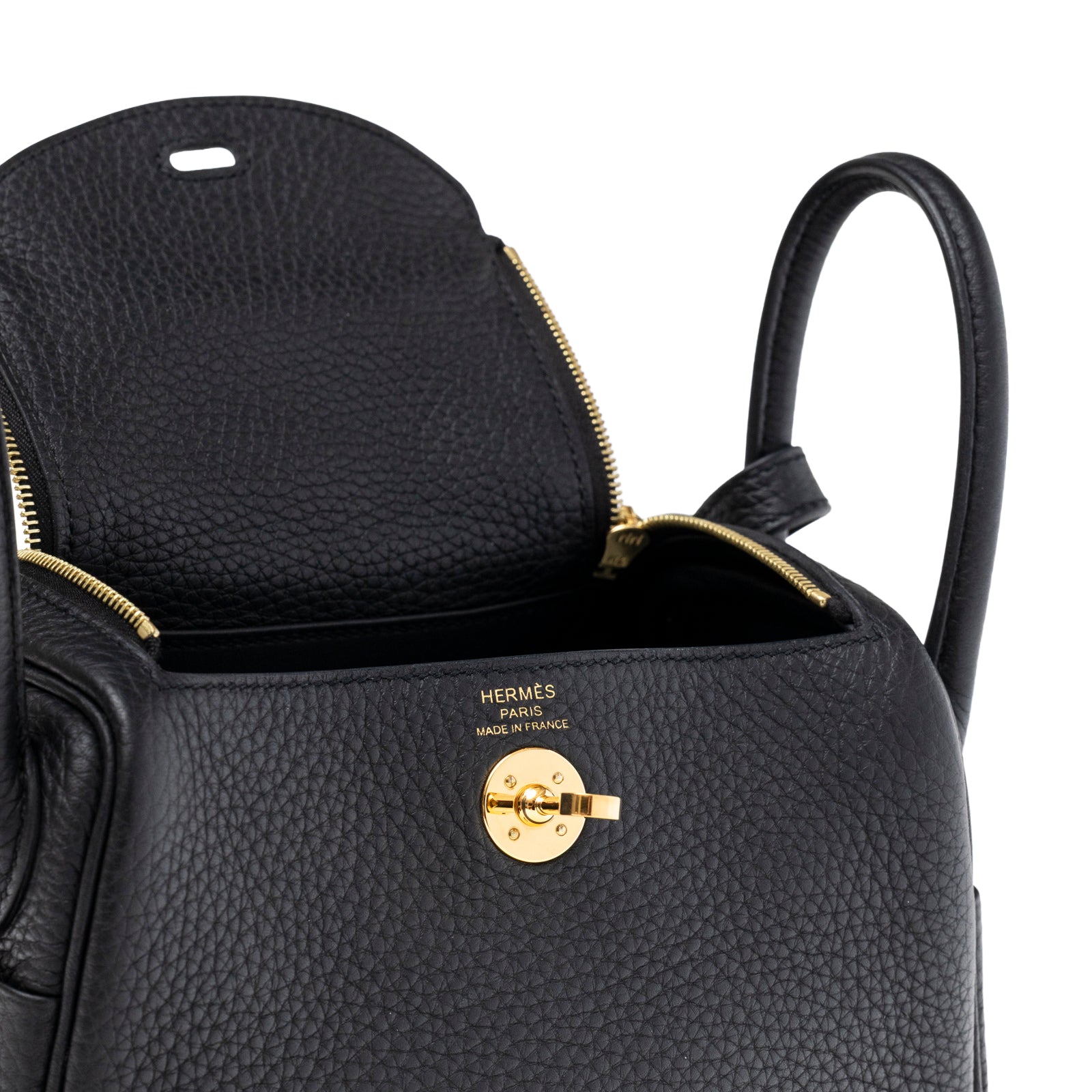 Close-up view of Hermès Mini Lindy I Black Clemence Gold Hardware showing open flap and lock detail