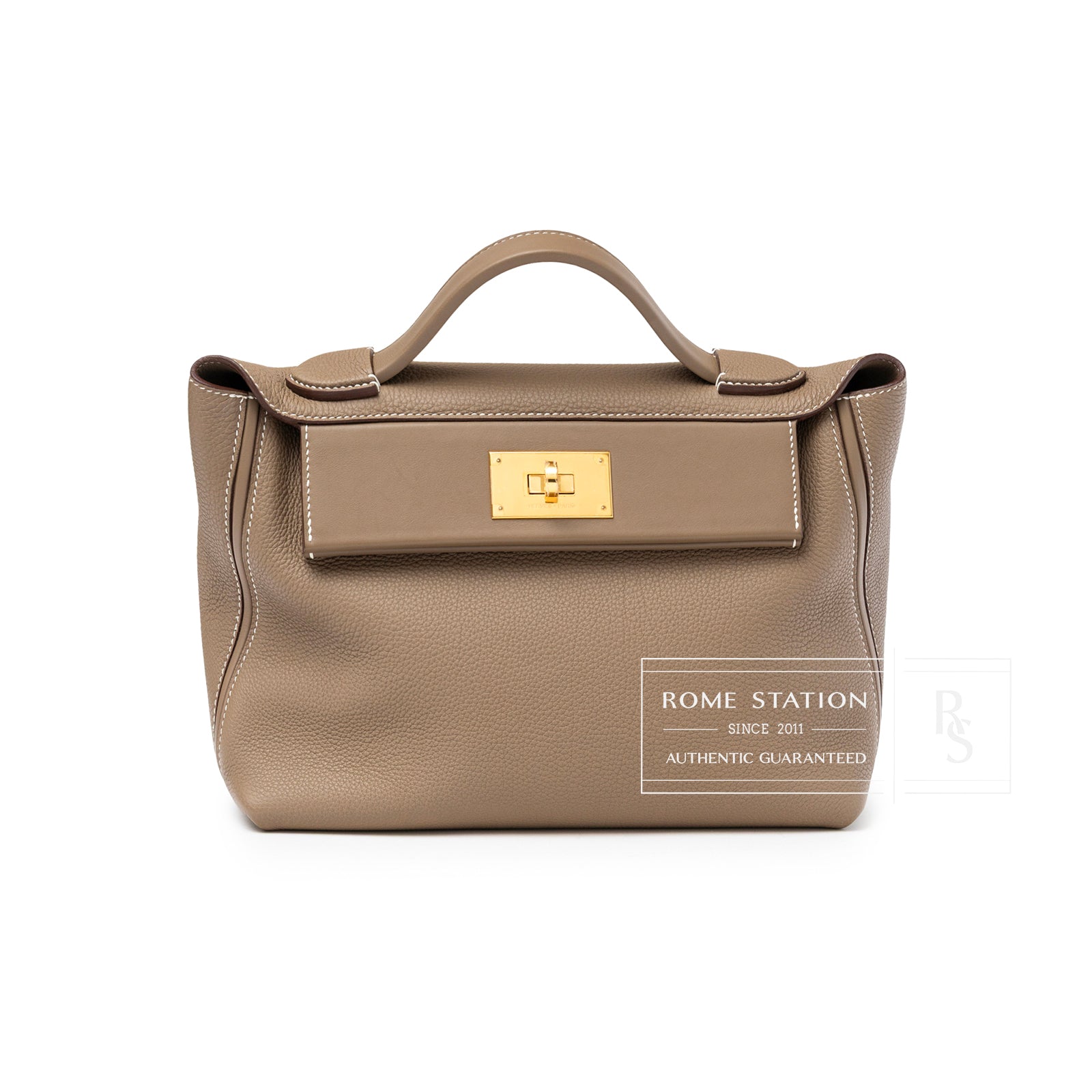 Front view of Hermès 24/24 29 Etoupe Togo and Swift Gold Hardware handbag with top handle and rectangular clasp