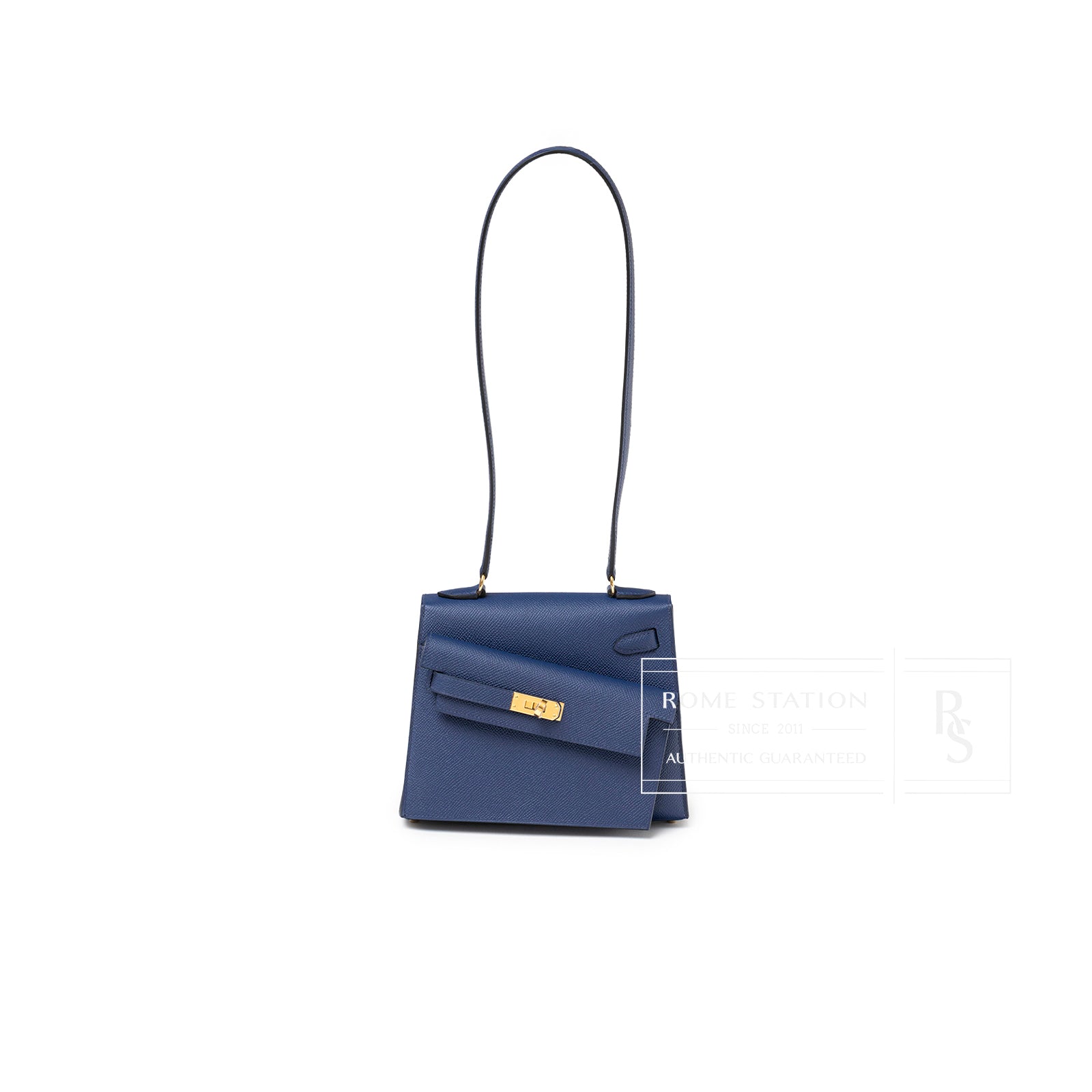 Front view of Hermès Kelly Desordre 20 Sellier Blue Saphir Epsom Gold Hardware with long strap and gold clasp