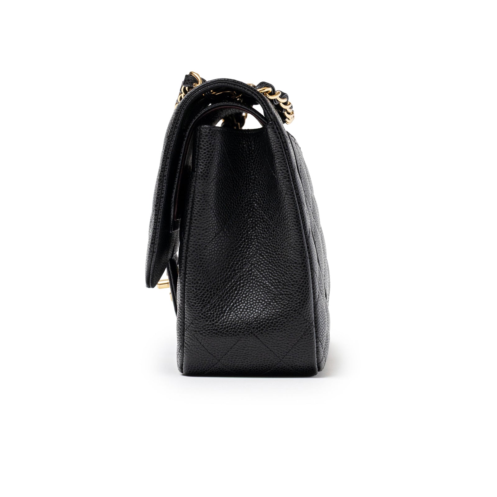 Side view of Chanel Classic Flap Jumbo Caviar Black Gold Hardware showing black textured leather and chain strap detail