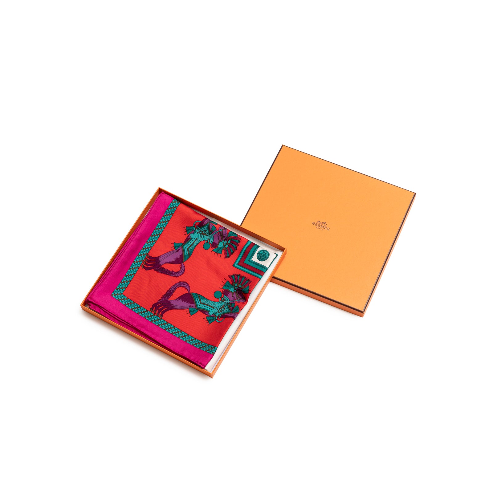 Top-down view of Hermès Carre 90 Harnais Francais Silk Scarf Rouge Vert Multi folded in Hermès orange box