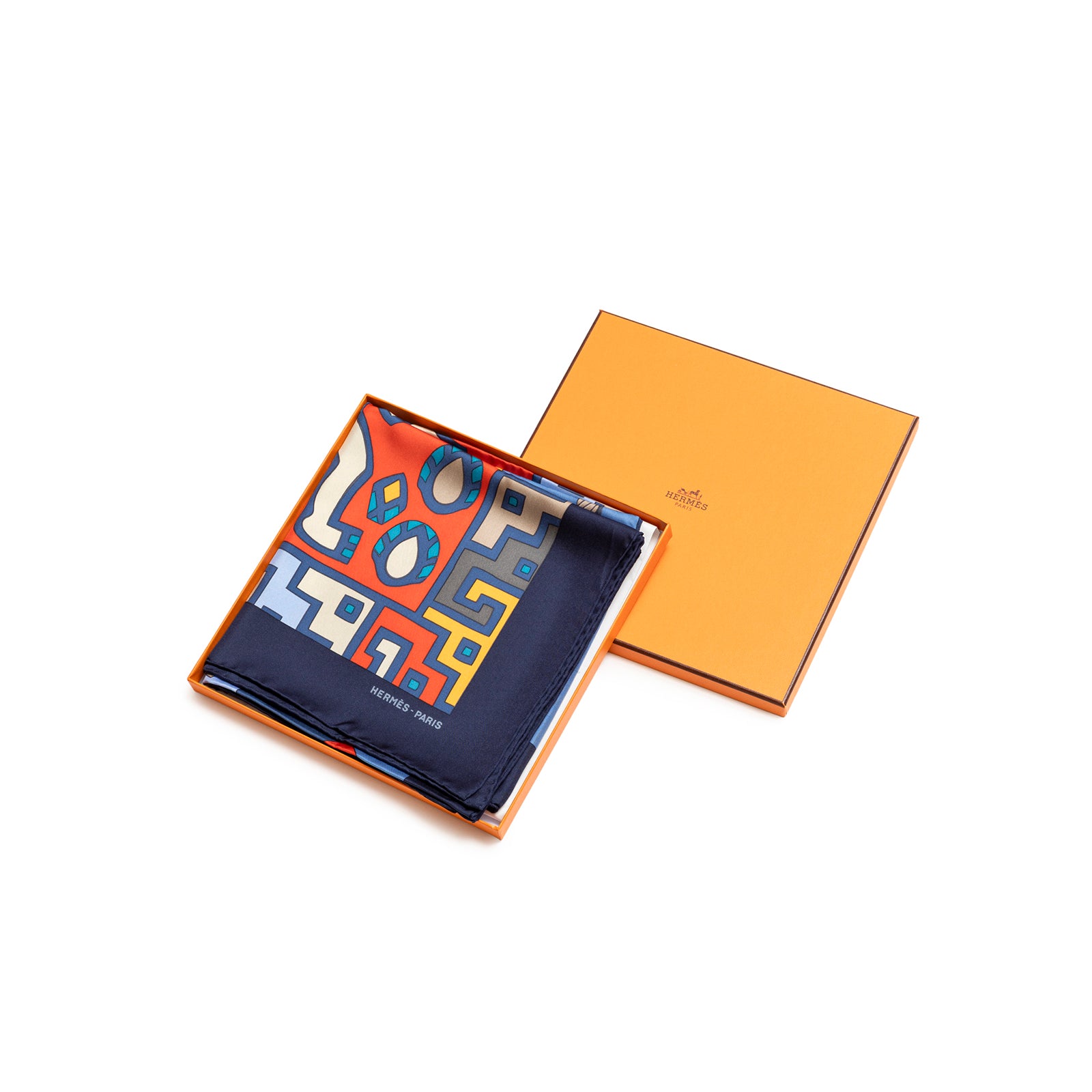 Hermès Carre 90 Huaca Piru 2 Silk Scarf Blue Marine Orange Rouge folded in Hermès orange box