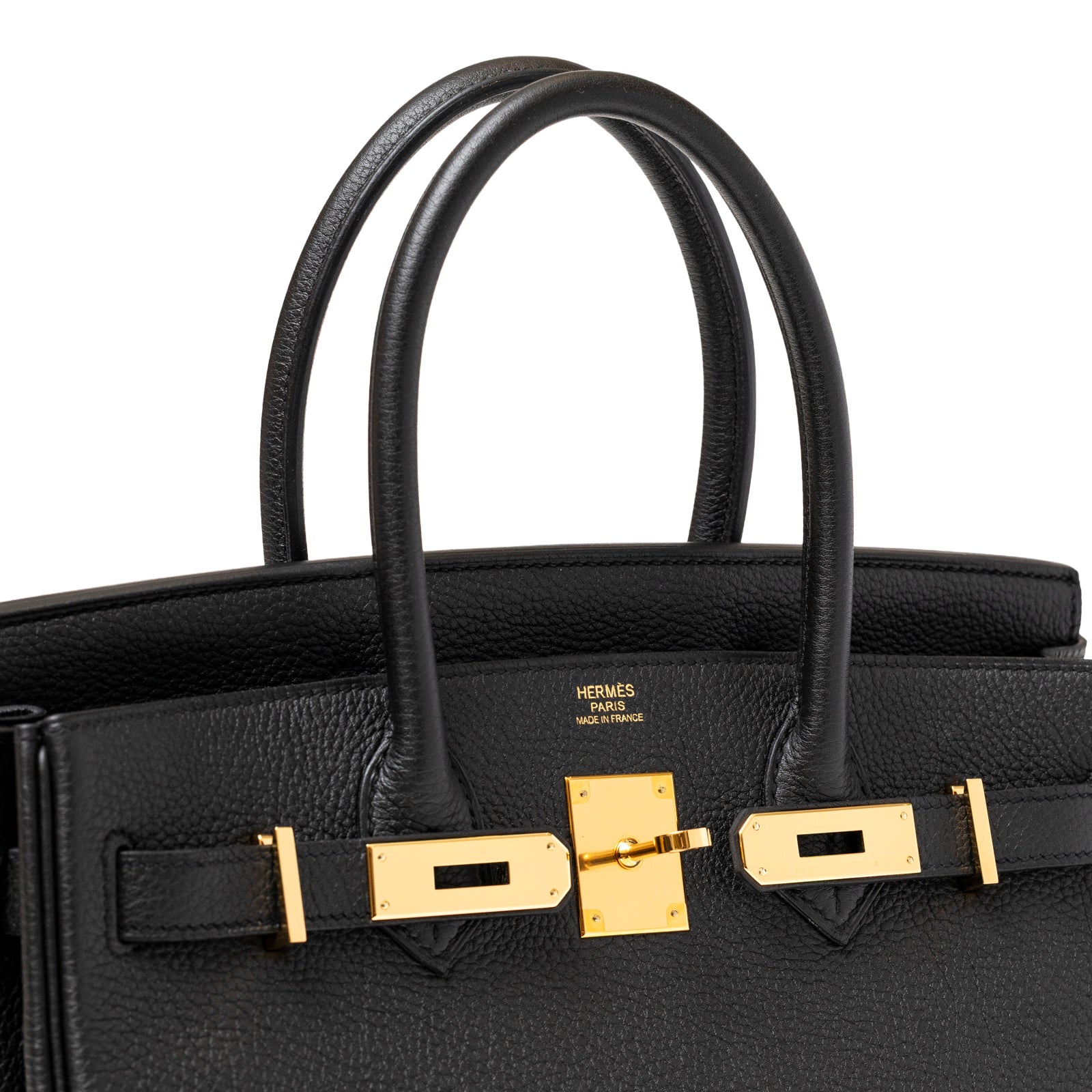 Close-up of Hermès Birkin 30 Black Togo Gold Hardware showcasing textured leather and luxurious gold clasp details