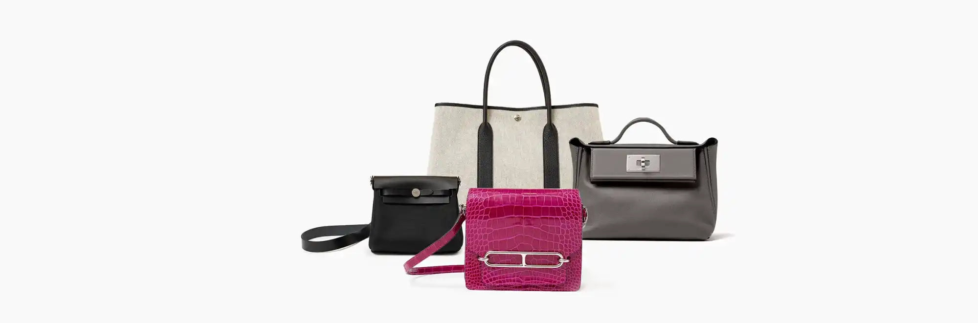 Assorted designer handbags.