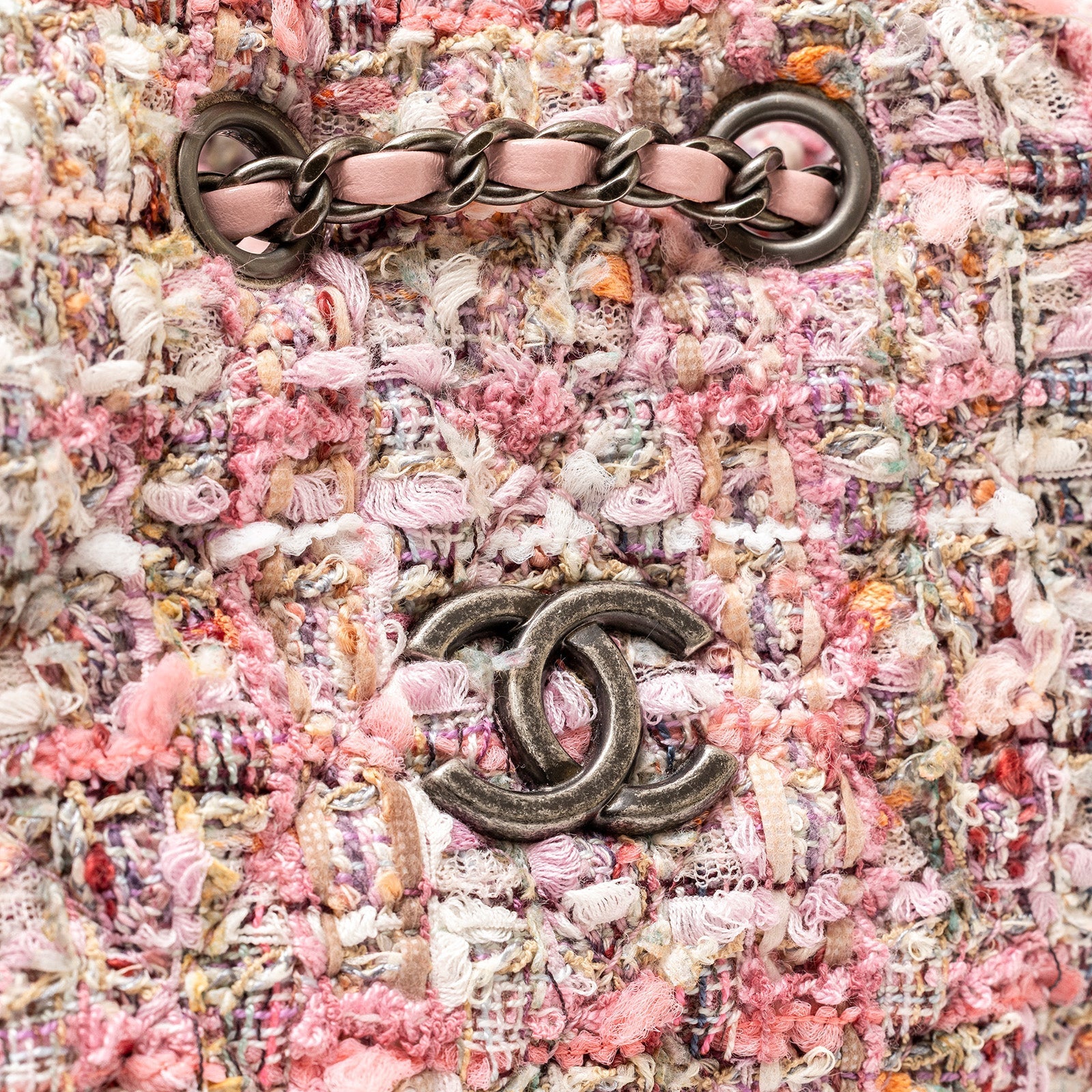 Close-up of pink tweed texture and palladium hardware on Chanel 19S Backpack Pink Tweed Palladium and Gold Hardware