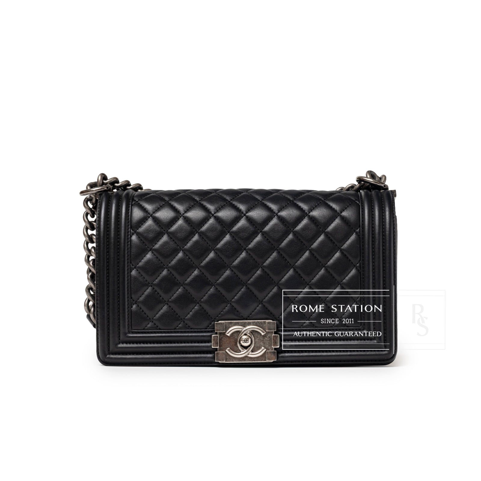 Front view of Chanel Boy Bag Medium Black Lambskin Ruthenium Hardware with quilted leather and clasp details